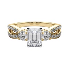 GIA Esmeralda de 1,7 ct Anillo de diamantes de oro amarillo de 18 quilates de tres piedras con vástago partido y pavé