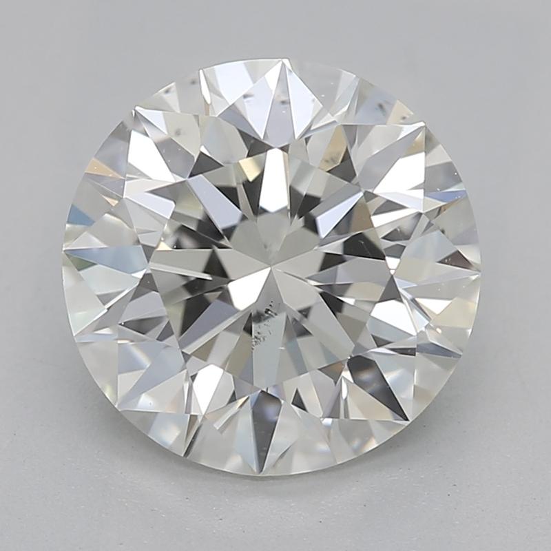 Découvrez une bague en diamant captivante avec une pierre centrale en diamant rond pesant 1,7 avec un J et un SI1. L'exceptionnelle qualité de fabrication est évidente dans le magnifique anneau en 