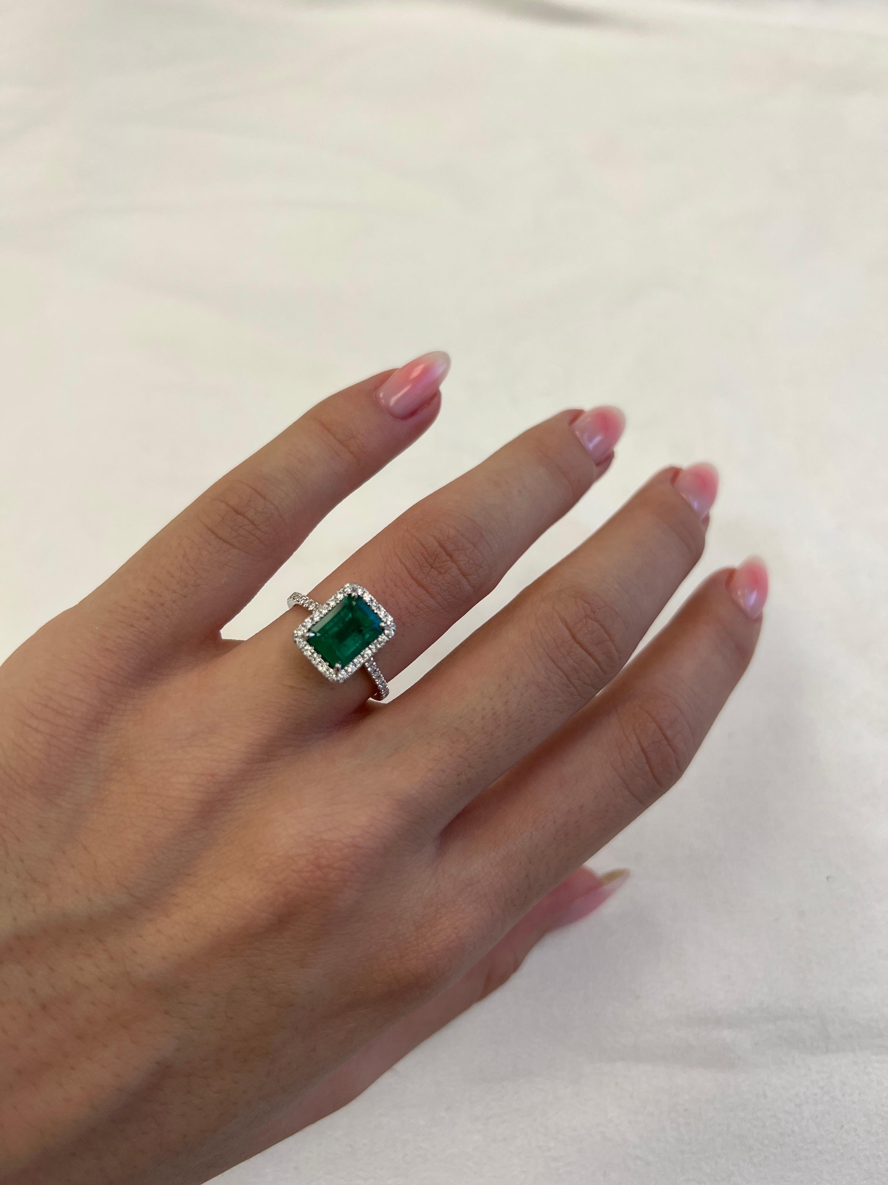 Contemporary GIA 1.81 carat Emerald and Diamond Halo Ring 18k White Gold For Sale