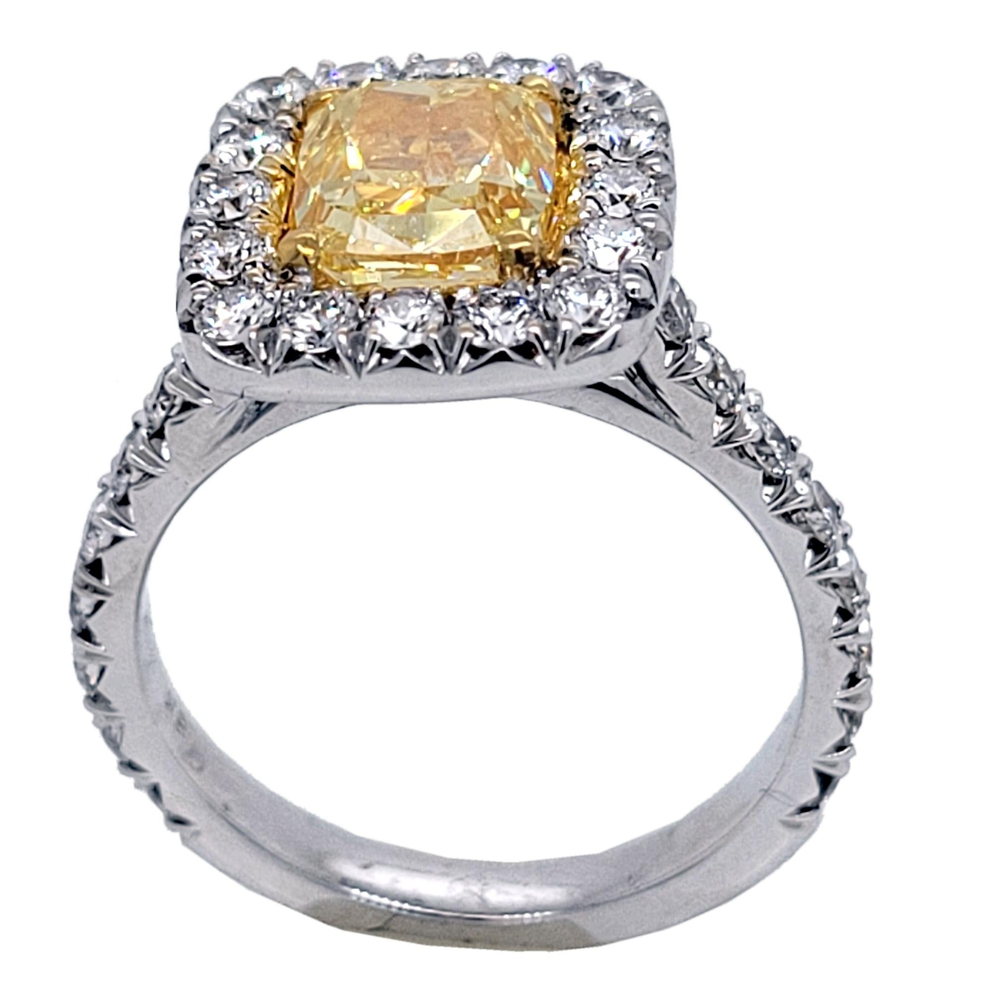 A very fine GIA Certified 1.81 Ct Cushion Cut Natural Fancy Intense Yellow center Diamond set in a fine 18k White Gold French Pave set Engagement Ring with Halo with total weight of 1.01 Ct on the side. #sayitwithyellow 

Diamond specs:
Center