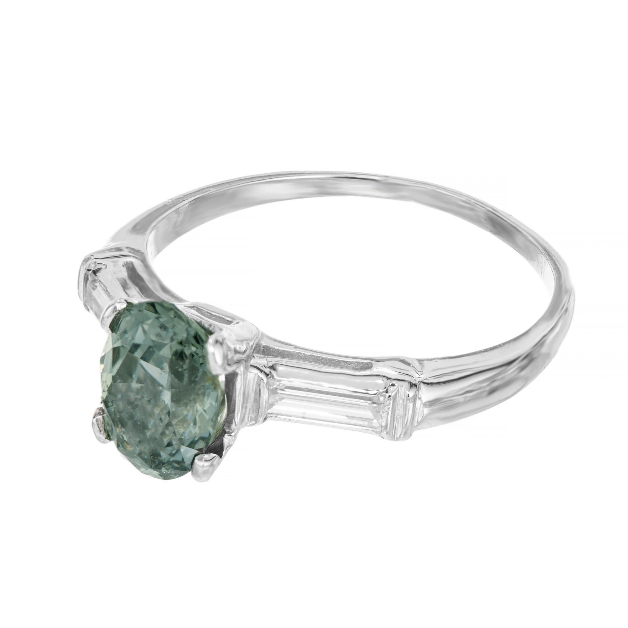 green sapphire engagement ring emerald cut