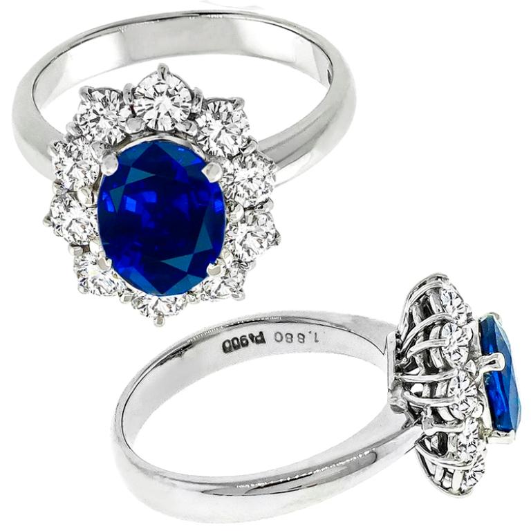 Made of platinum, his ring is centered with a sparkling GIA certified no heat natural oval cut sapphire that weighs 1.88ct. The center stone is accentuated by sparkling round cut diamonds that weighs approximately 1.00ct. graded G color with VS