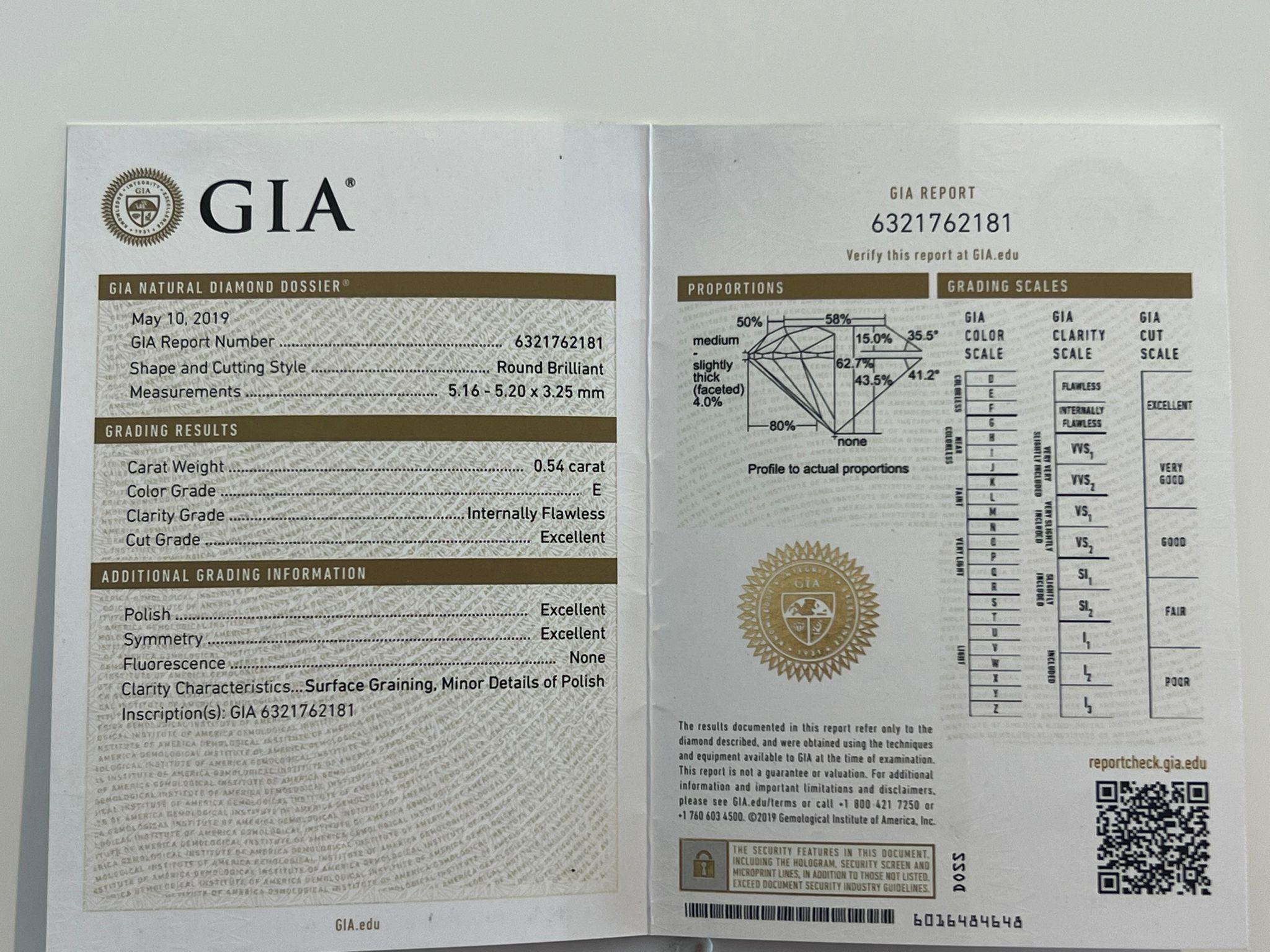 GIA Bague de fiançailles en or blanc 18ct avec diamant 0.68ct en vente 5