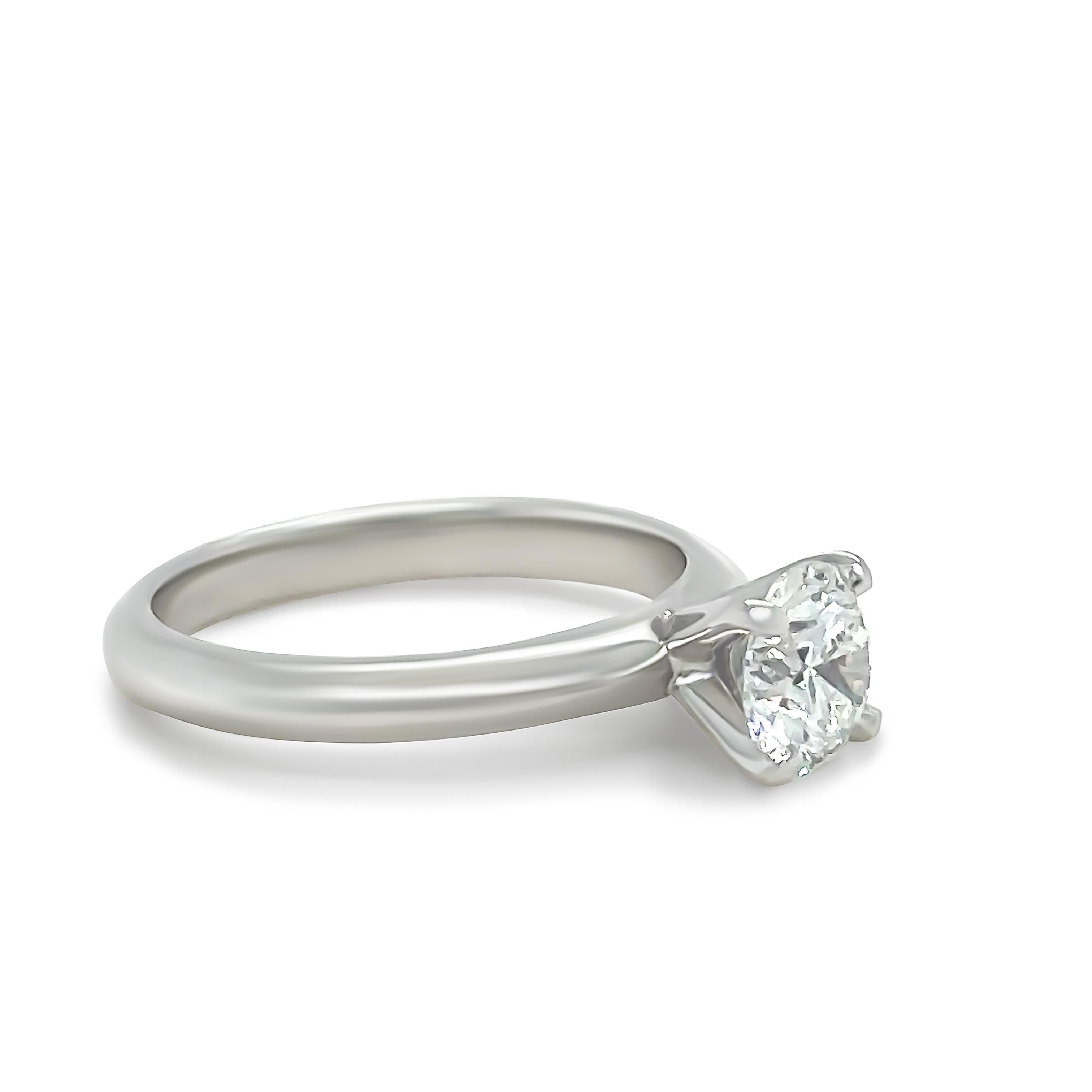 A GIA Engagement Ring, made of 18ct White Gold. Featuring one claw set Natural Round Brilliant Cut Diamond, E Colour, VS2 Clarity, with a total carat weight of 0.72ct.

Metal: 18ct White Gold
Carat: 0.72ct
Colour: E
Clarity: VS2
Cut: Round Brilliant