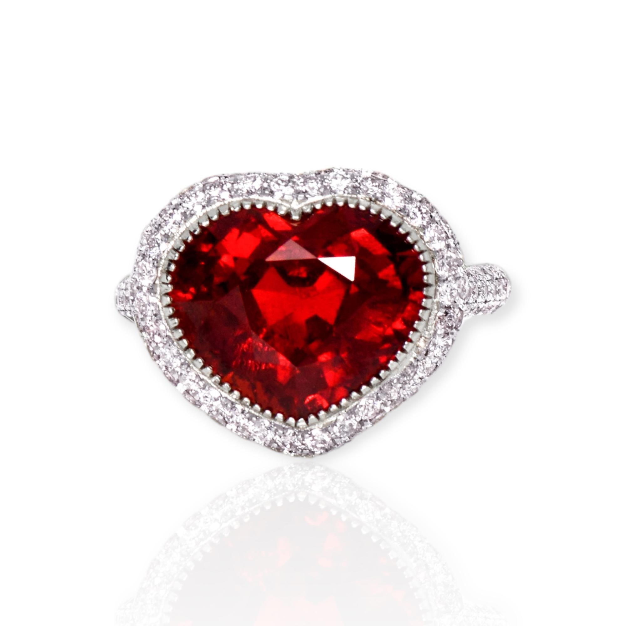 *GIA-certified 18K White Gold 9.78 Ct Pigeon Blood Red Garnet&Pink Diamonds Engagement Ring **

Natural top-quality Pigeon Blood Red Garnet weighing 9.78 ct set on the 18K white gold pave' design band with natural pink diamonds weighing 1.43