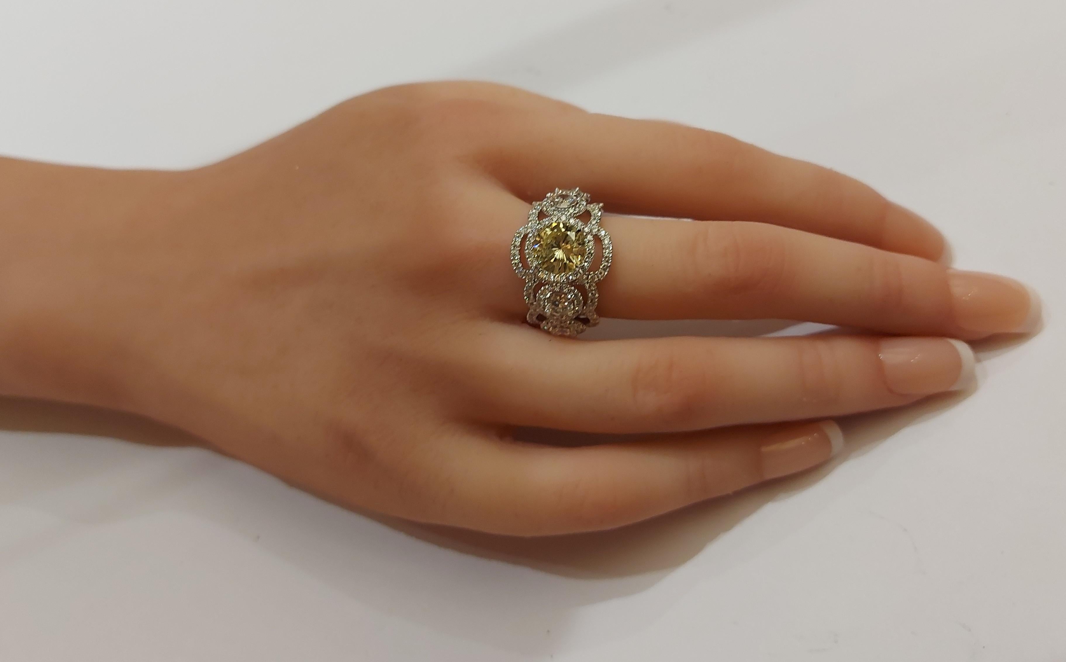 GIA 18kt White Gold Ring 2ct Fancy Yellow Diamond & 4.2 Ct Surrounding Diamonds For Sale 1