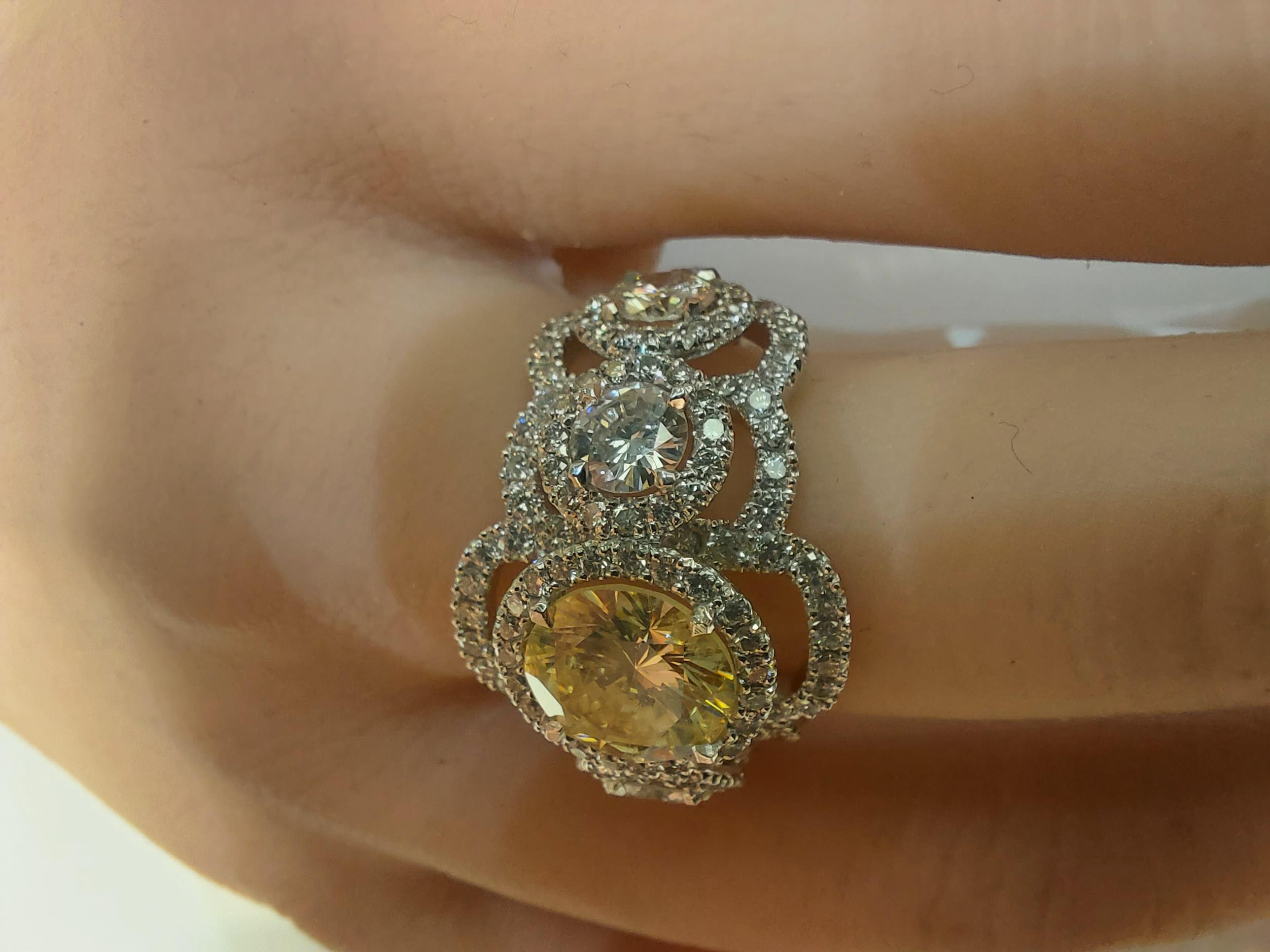 GIA 18kt White Gold Ring 2ct Fancy Yellow Diamond & 4.2 Ct Surrounding Diamonds For Sale 3
