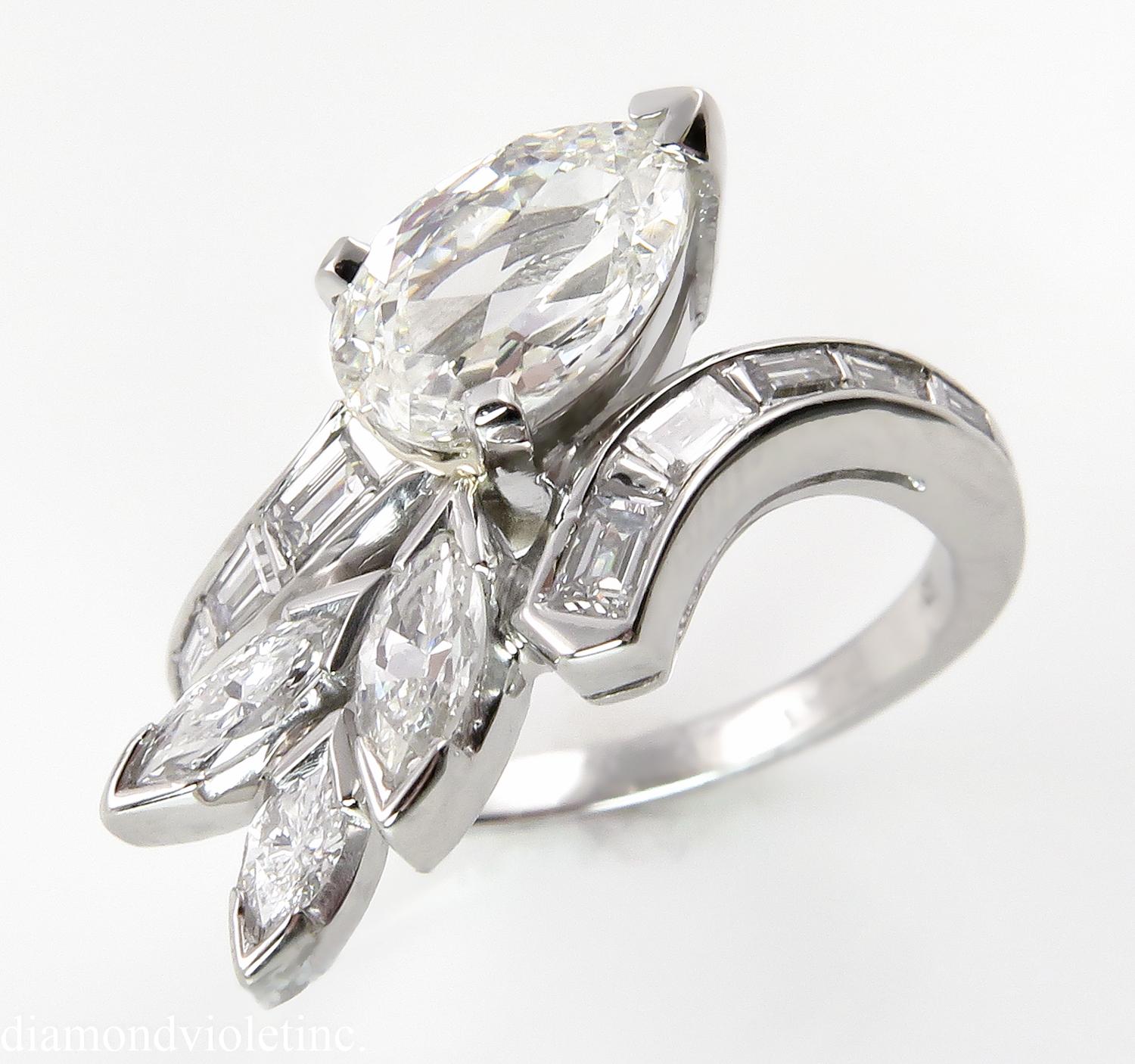 An Amazing and Important Estate Engagement Handmade Platinum (stamped) Ring with GIA Certified 1.05CT Old cut Pear Shape Center Diamond in J color VS1 clarity (Near COLORLESS and Very clear). The Measurements of the Center Diamond are