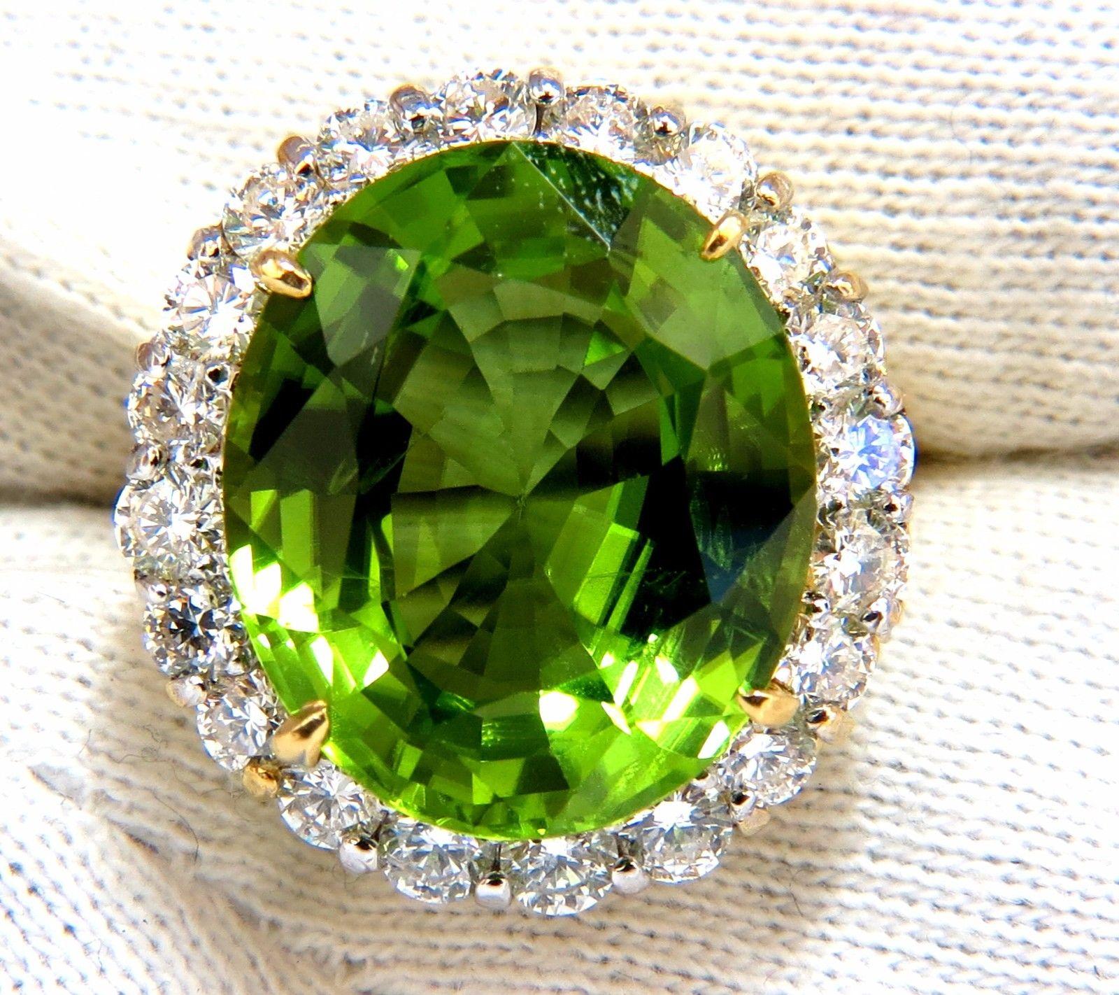 Oval Cut Peridot Classic Halo Raised Victorian Cluster

GIA Certified 17.49ct. Natural Peridot ring.

Cushion cut, clean clarity & Transparent.

Classic Green Color

 Clean clarity.

18.99 X 16.10 X 8.53mm



2.40ct Side round diamonds 

Full cut