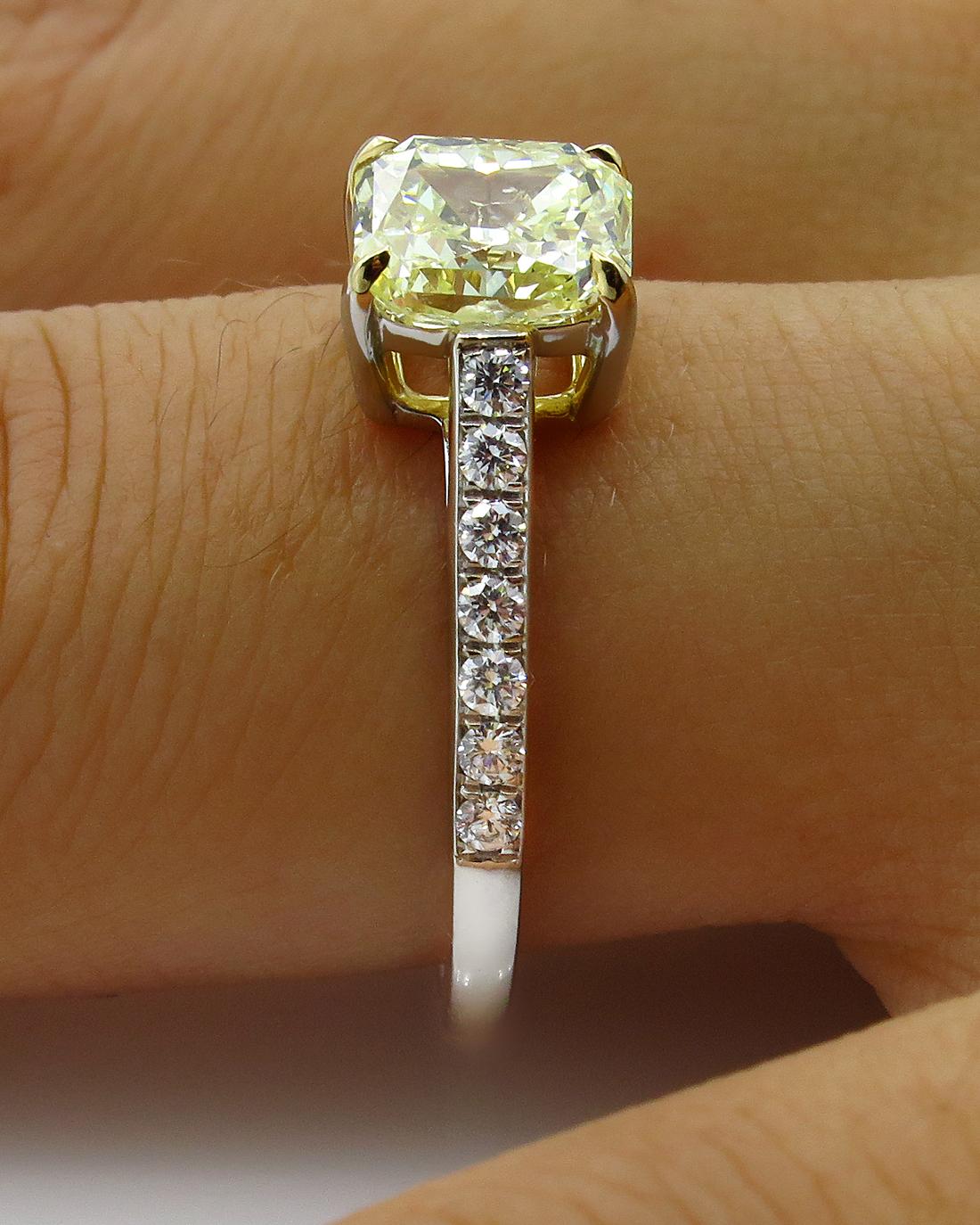 GIA 1.98 Carat Fancy Yellow Radiant Cut Diamond Solitaire Platinum Ring For Sale 7