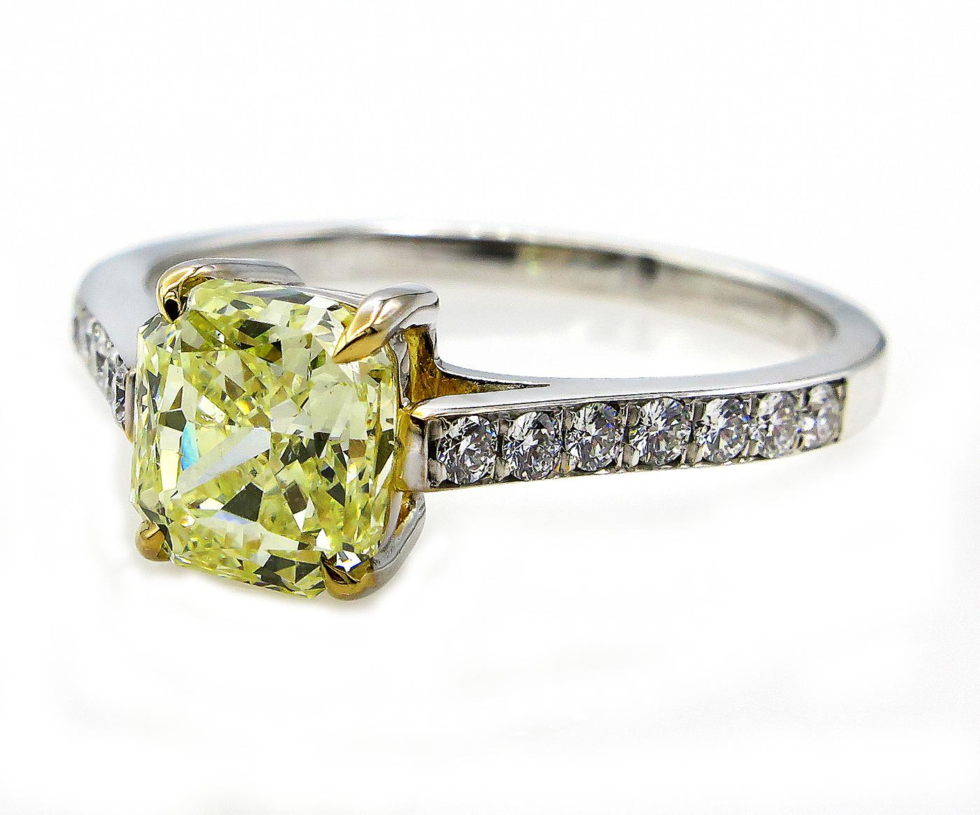 This is ring is just Beautiful! A beams of sunshine radiate day and night from this fabulous dazzler with gorgeous center natural fancy color diamond is ignited by bright white diamonds that shimmer with real sparkle and flair.
Very Bright Center is