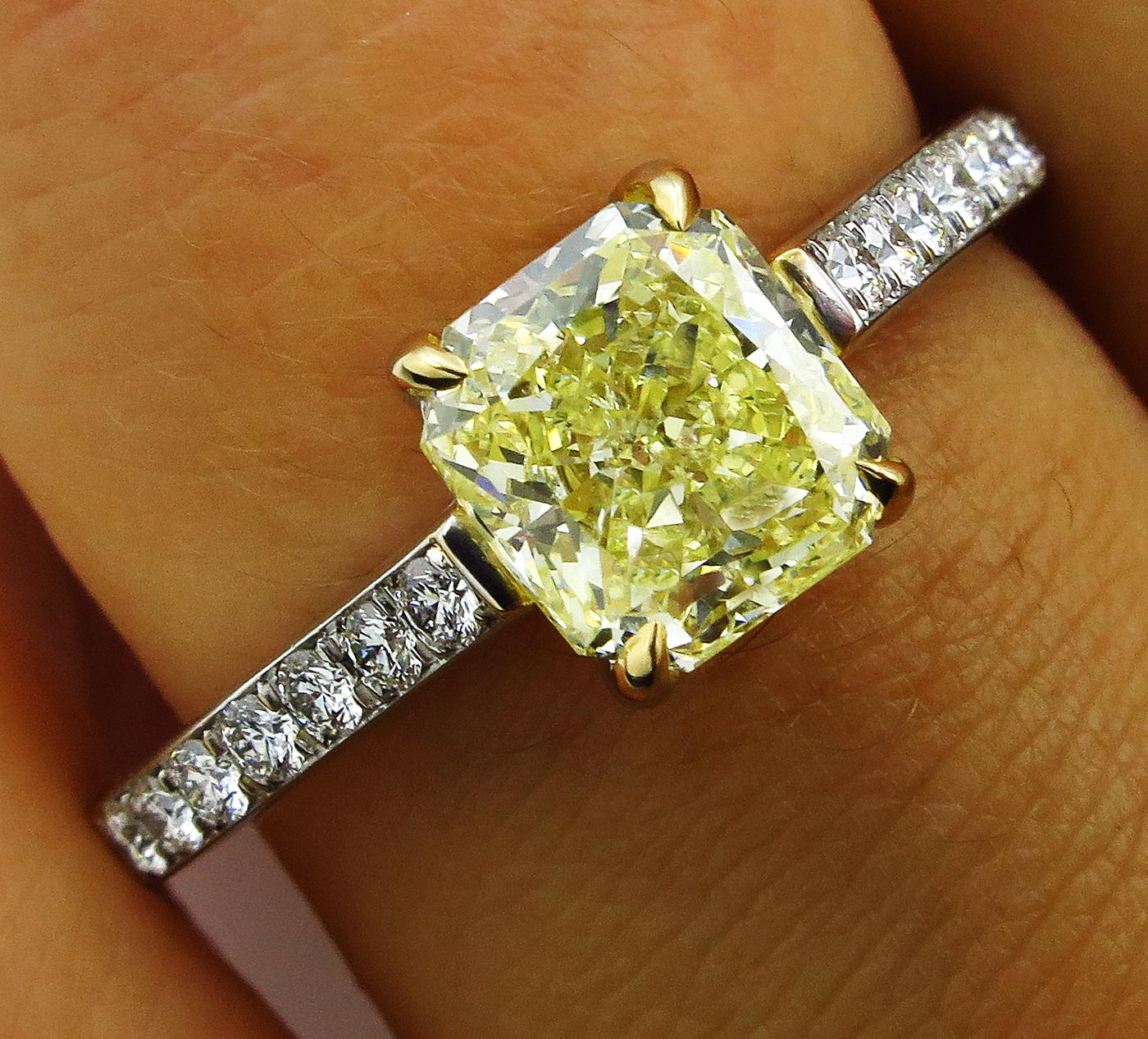 GIA 1.98 Carat Fancy Yellow Radiant Cut Diamond Solitaire Platinum Ring For Sale 2