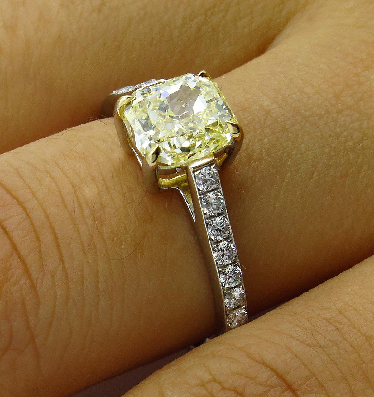 GIA 1.98 Carat Fancy Yellow Radiant Cut Diamond Solitaire Platinum Ring For Sale 5