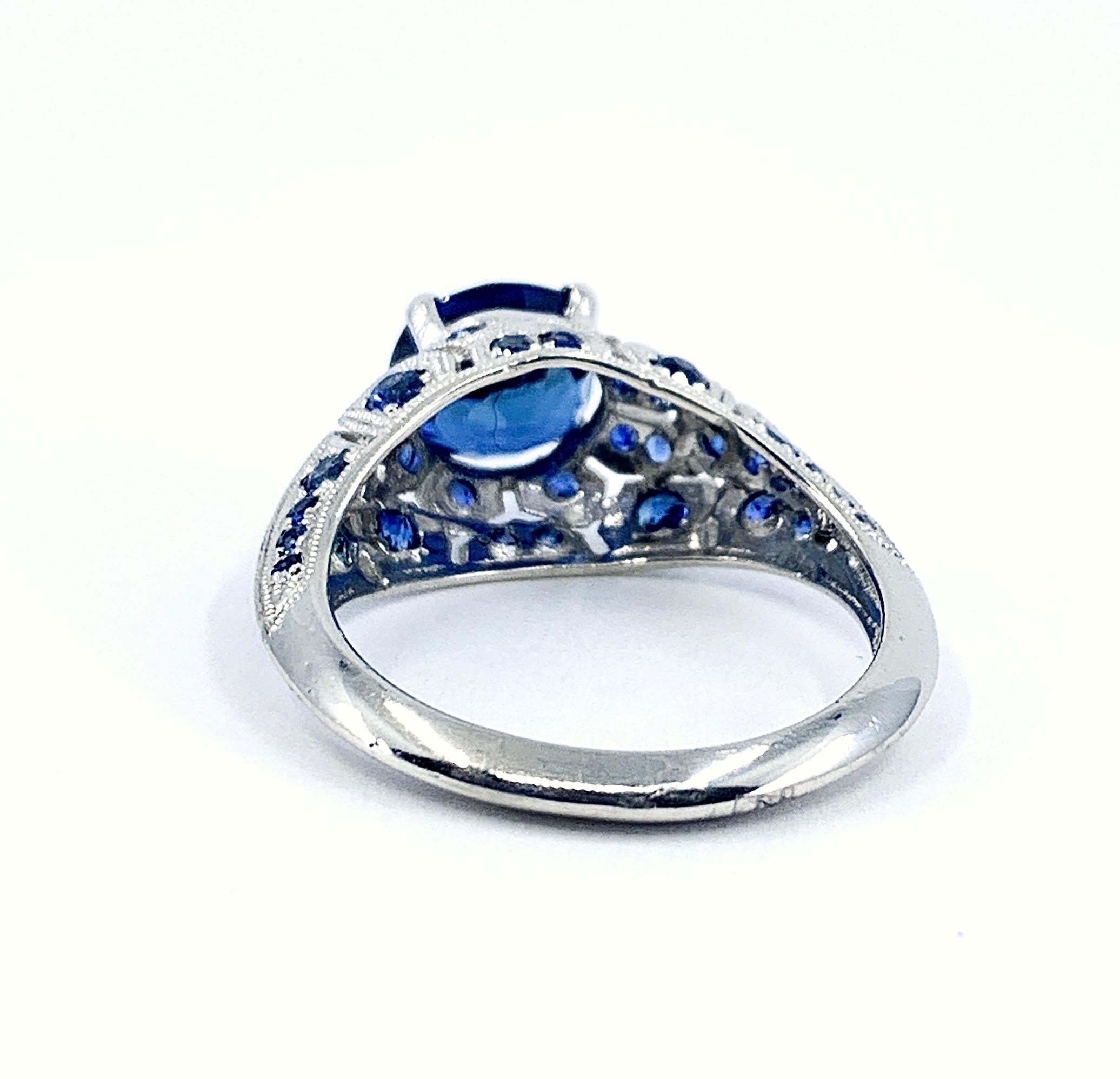 GIA-Certified 1.99 Carat Oval Sapphire in Platinum Edwardian-Style Bombe Setting For Sale 6