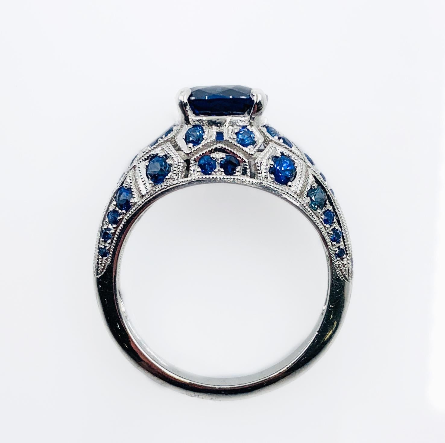 GIA-Certified 1.99 Carat Oval Sapphire in Platinum Edwardian-Style Bombe Setting For Sale 7