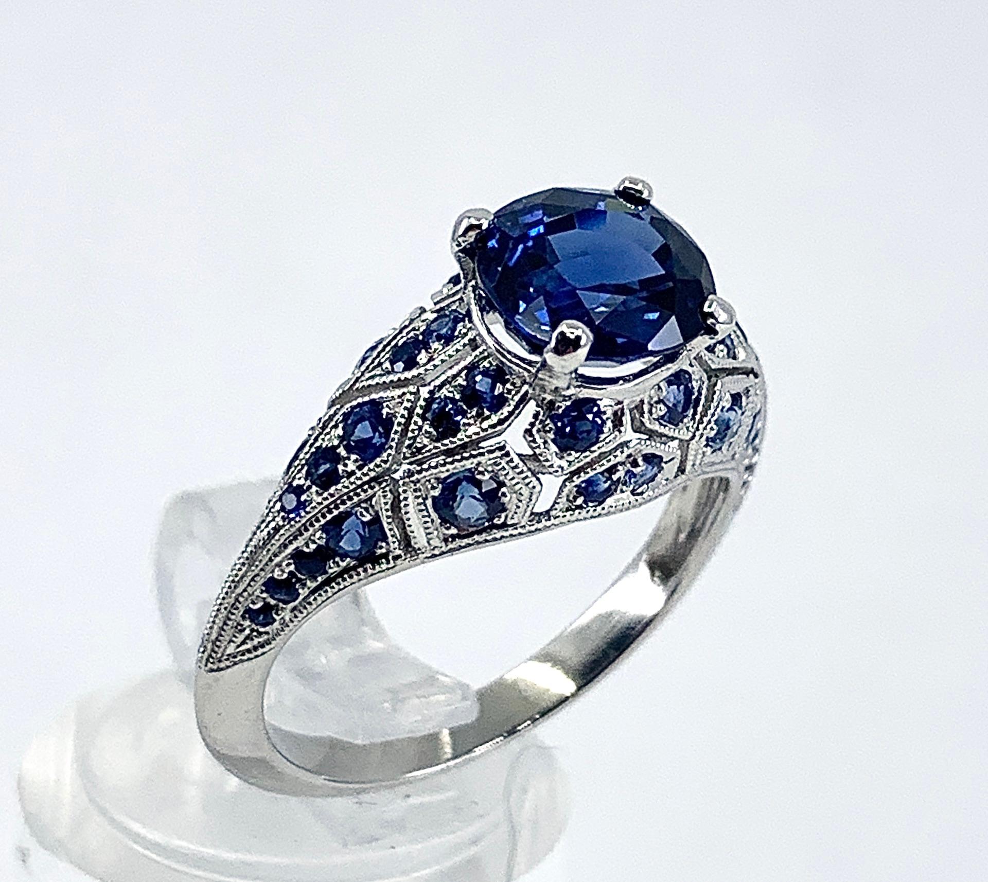 GIA-Certified 1.99 Carat Oval Sapphire in Platinum Edwardian-Style Bombe Setting In New Condition For Sale In Sherman Oaks, CA