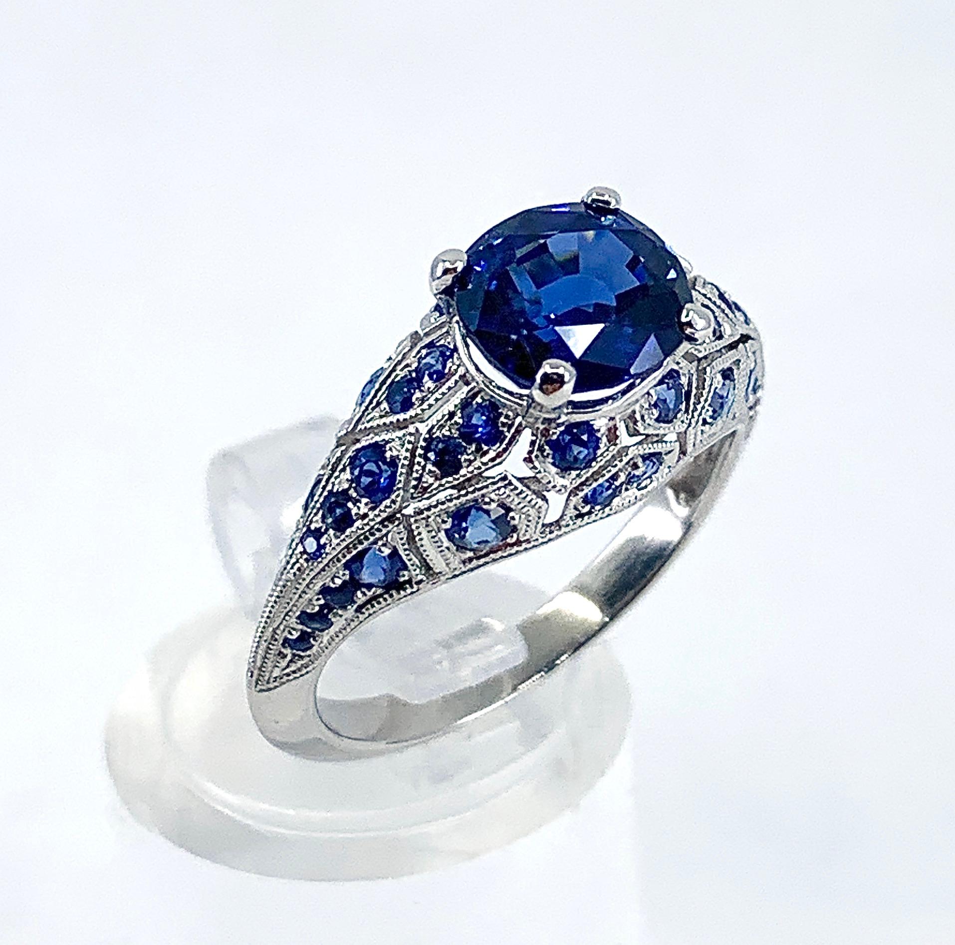 Women's or Men's GIA-Certified 1.99 Carat Oval Sapphire in Platinum Edwardian-Style Bombe Setting For Sale