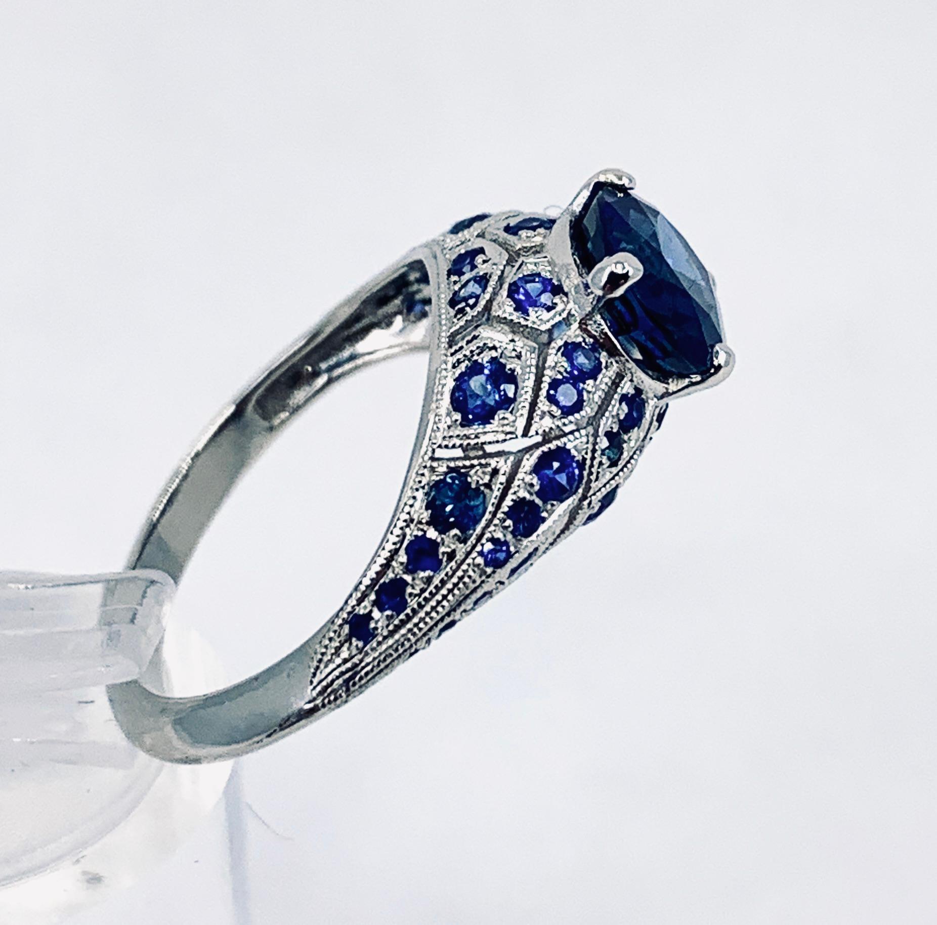 GIA-Certified 1.99 Carat Oval Sapphire in Platinum Edwardian-Style Bombe Setting For Sale 1