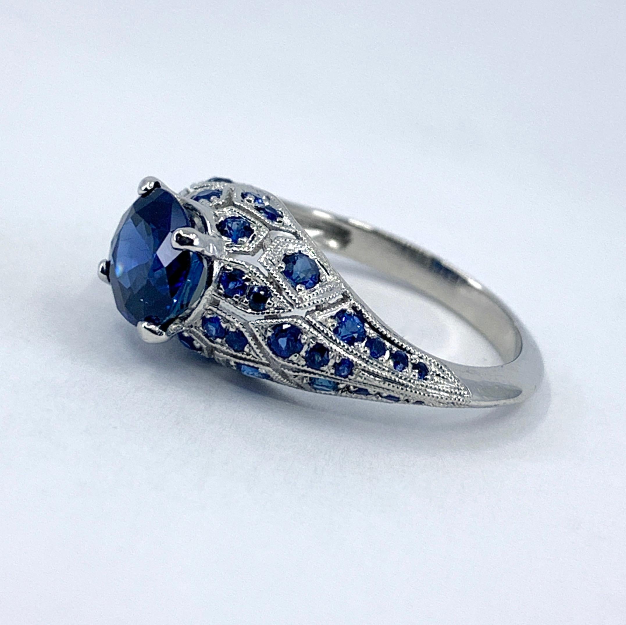 GIA-Certified 1.99 Carat Oval Sapphire in Platinum Edwardian-Style Bombe Setting For Sale 3