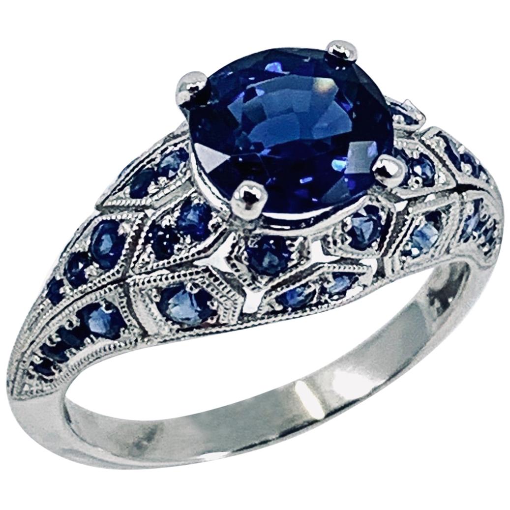 GIA-Certified 1.99 Carat Oval Sapphire in Platinum Edwardian-Style Bombe Setting For Sale