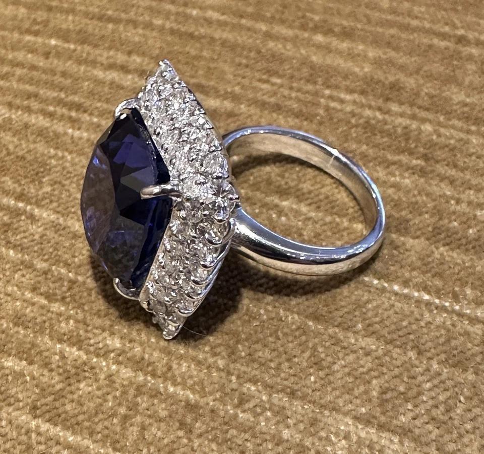 Women's GIA 19.97 carat Cushion Tanzanite Ring with Diamond Halo in Platinum For Sale