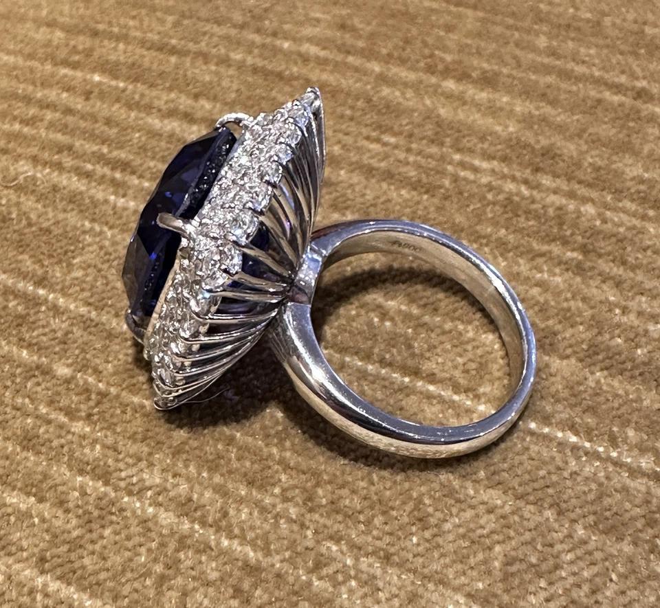 GIA 19.97 carat Cushion Tanzanite Ring with Diamond Halo in Platinum For Sale 1
