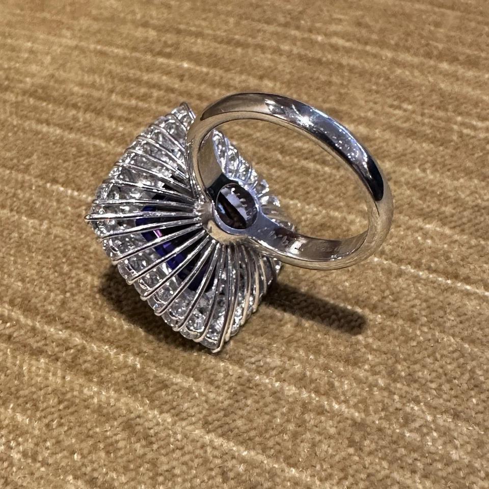 GIA 19.97 carat Cushion Tanzanite Ring with Diamond Halo in Platinum For Sale 3