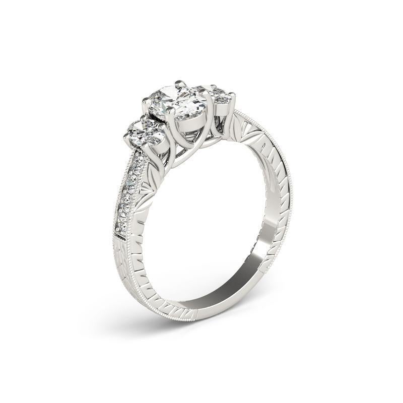Donna GIA 1ct ovale a tre pietre inciso su canale  Anello con diamante in vendita