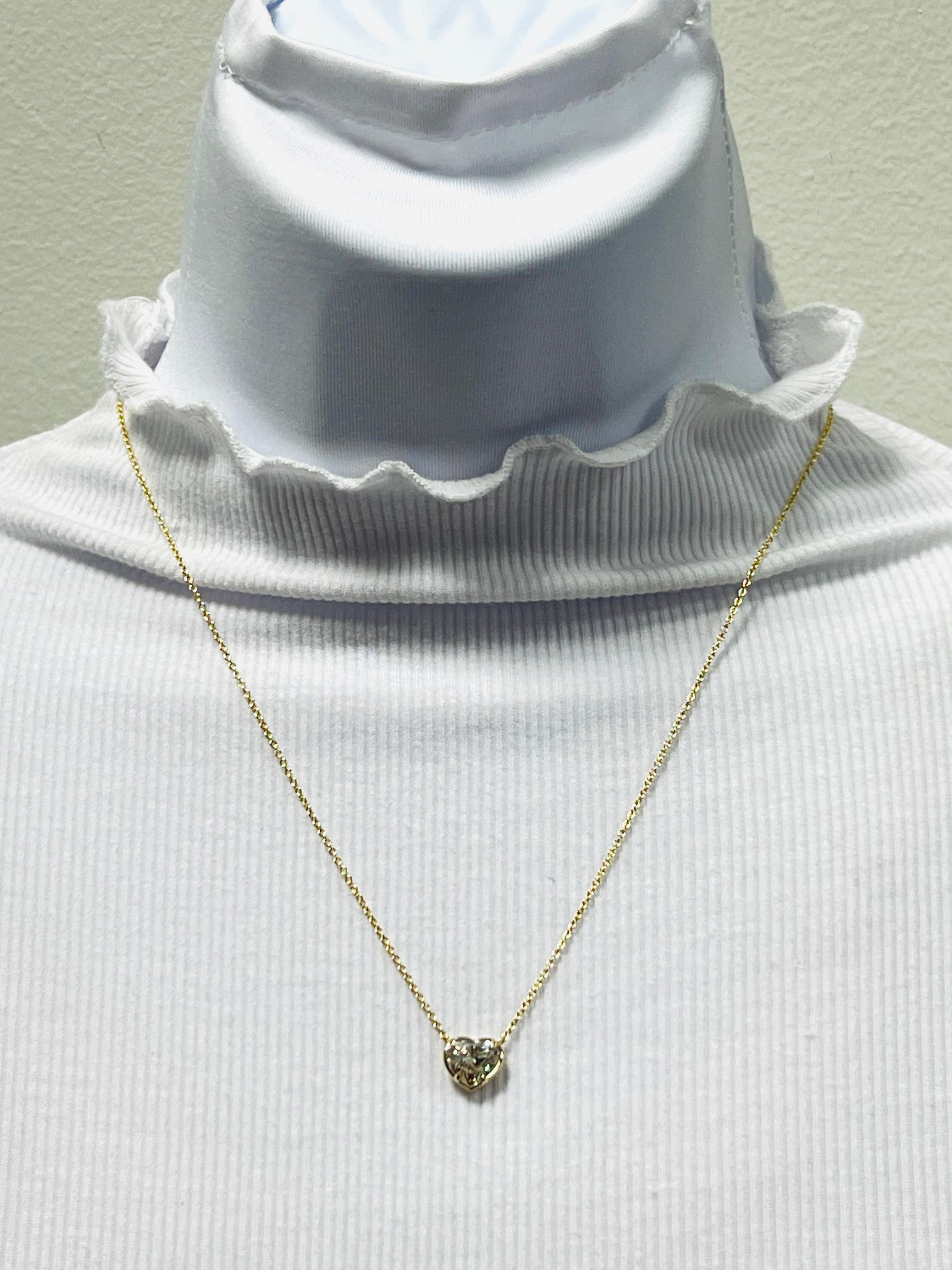 Gorgeous 2.03 ct. I SI2 white diamond heart shape.  Handmade in 18k yellow gold.  Length is 18