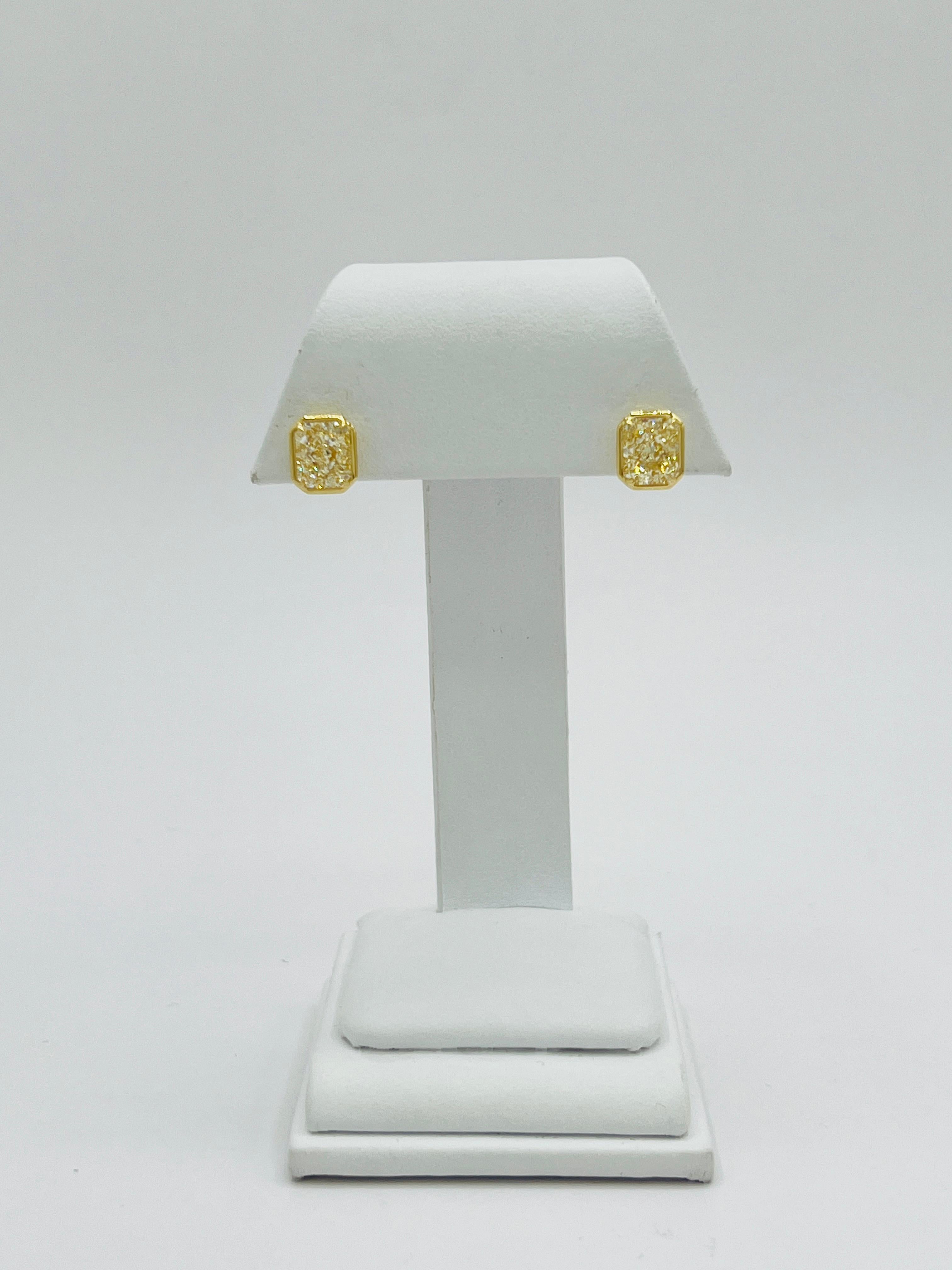 GIA 2 Carats Each Radiant Yellow Diamond Bezel Stud Earrings in 18K Yellow Gold In New Condition For Sale In Los Angeles, CA