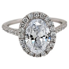GIA 2.00 Carat F/SI1 Oval Diamond Pave Set Engagement Ring with Halo