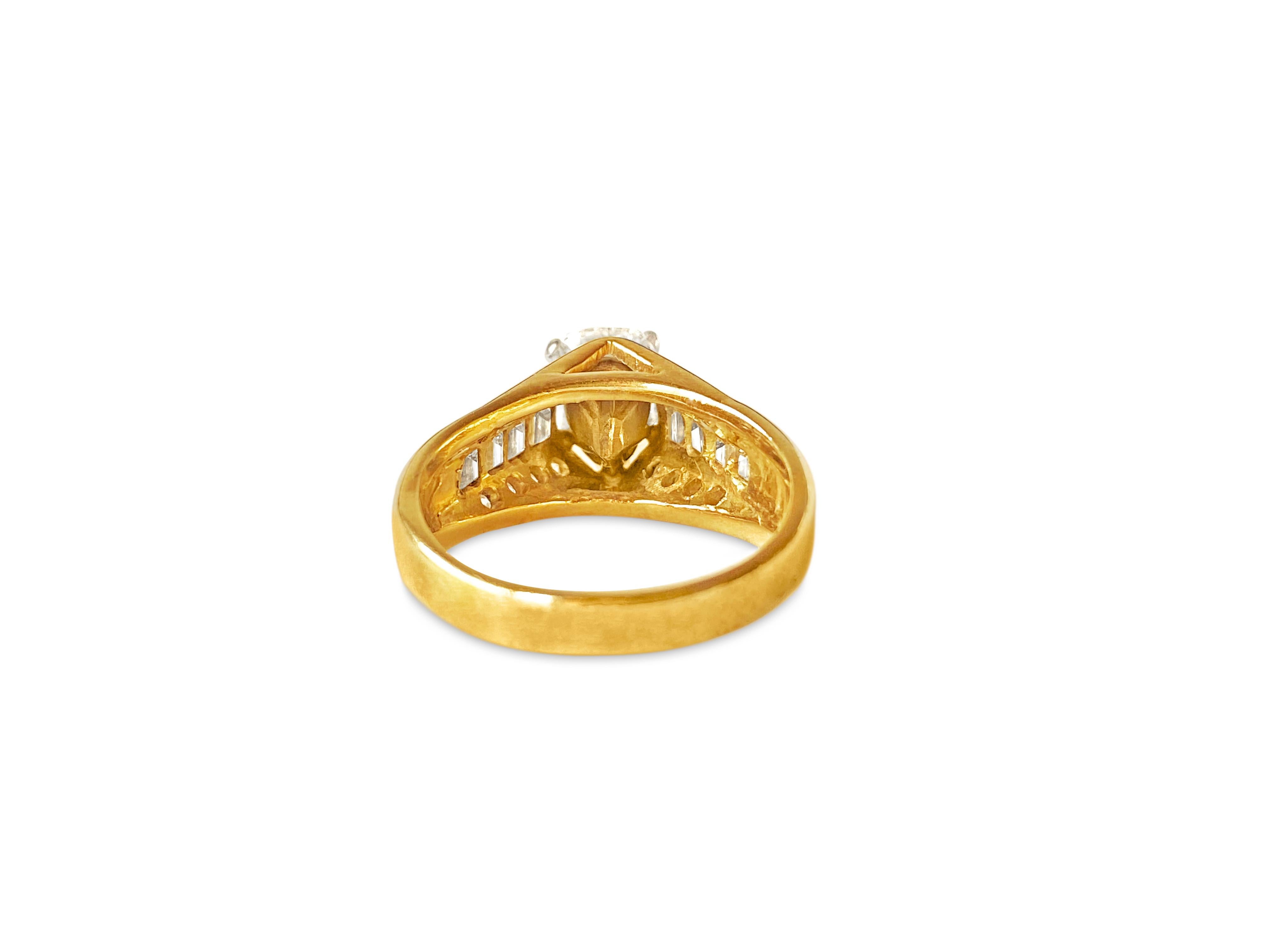 Crafted from solid 18K yellow gold, this exquisite ring is a true testament to luxury. At its center gleams a dazzling 1.00-carat pear-cut diamond, boasting VS1 clarity and G color, securely held in place. Surrounding it are 1.00 carats of round and