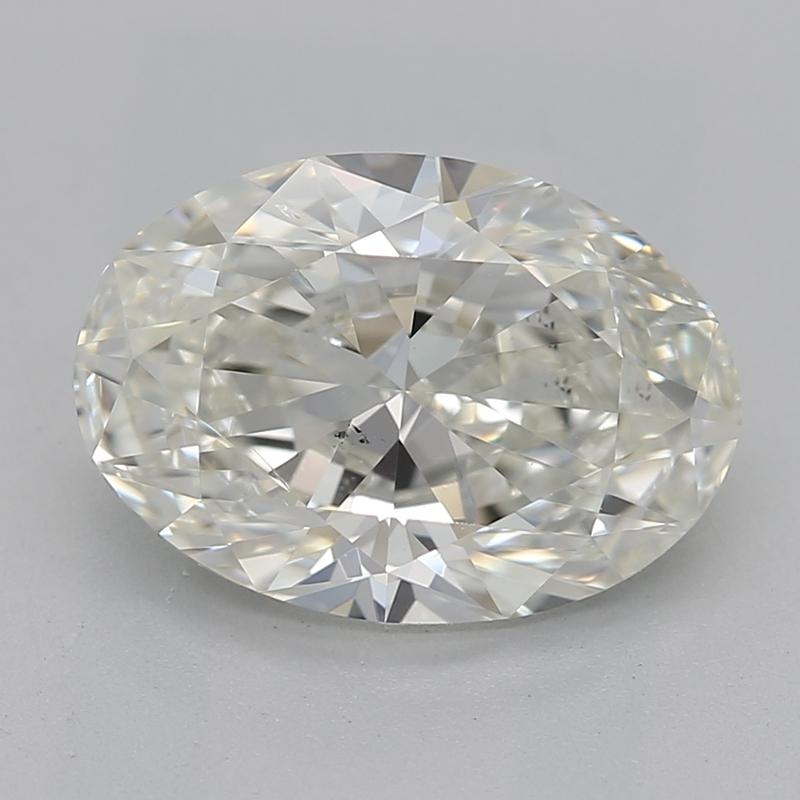 Handcrafted in New York, this exquisite diamond ring features a breathtaking oval center stone weighing 2.00. The diamond boasts a beautiful J and SI1 , ensuring exceptional clarity and brightness that will catch the eye from every angle. The