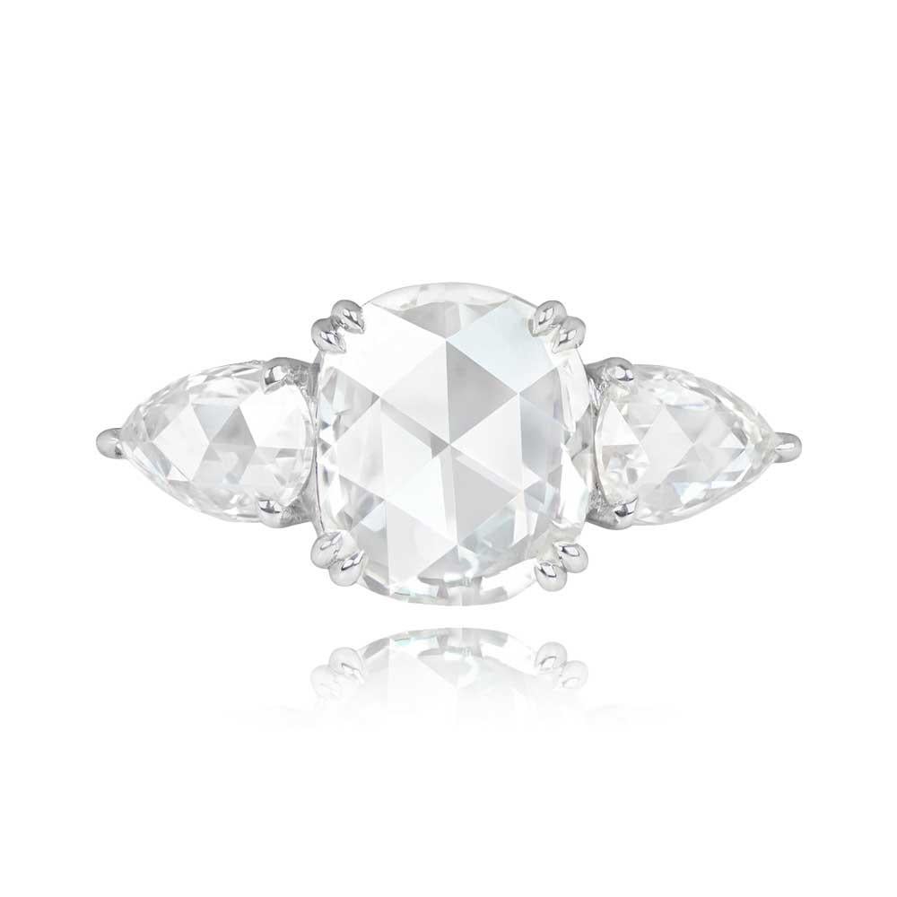An exquisite platinum three-stone engagement ring with a GIA-certified 2.00-carat rose-cut diamond at K color and VS2 clarity. Pear-shaped rose-cut diamonds on the shoulders weigh 1.21 carats in total. Micro-pave round brilliant-cut diamonds with