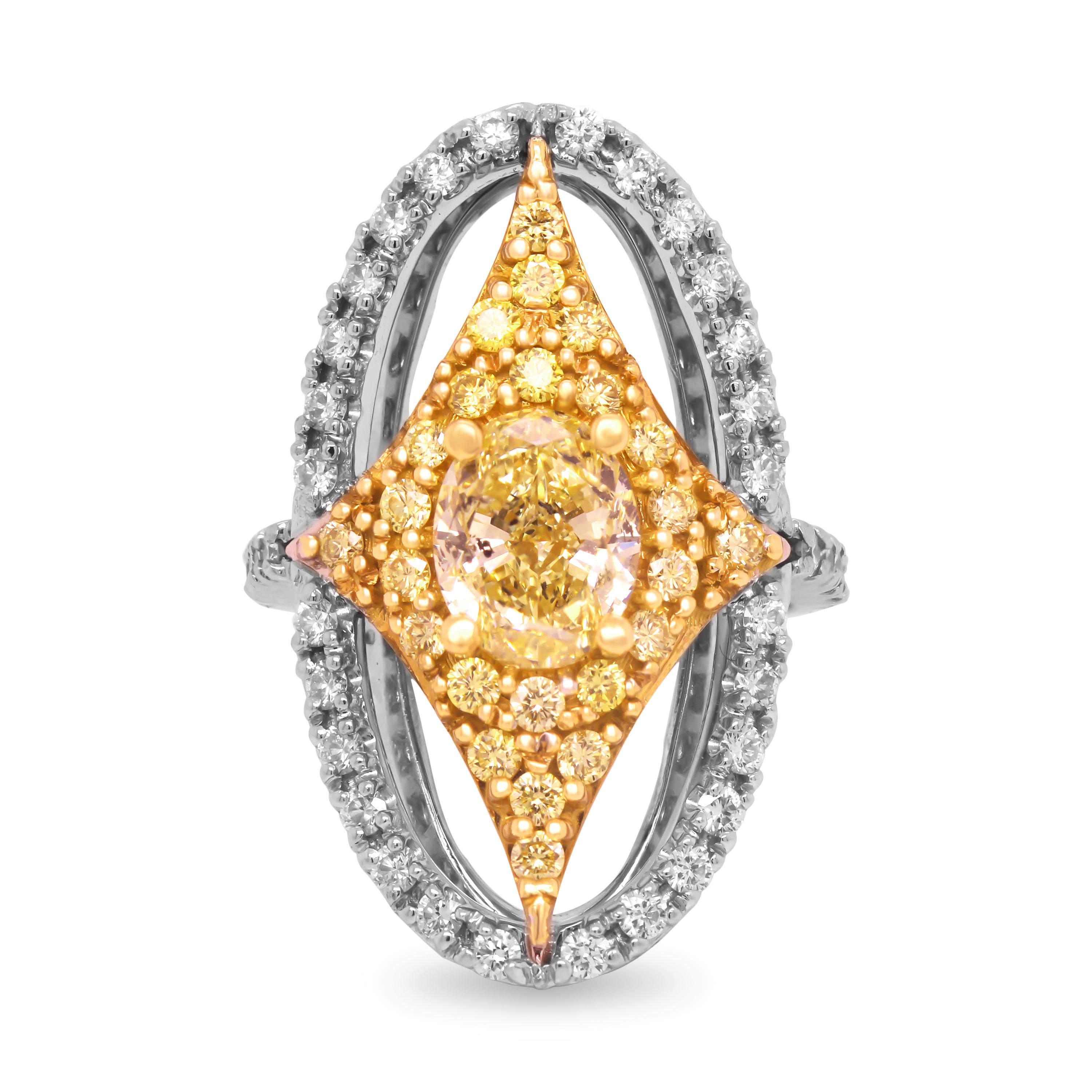GIA 2.01 Carat Fancy Yellow Diamond Oval Ring with Yellow Diamonds Set in Platinum and 18K Yellow Gold

This oval ring features a four cornered design with an oval frame set with yellow diamonds and a Fancy yellow diamond center. This ring is a
