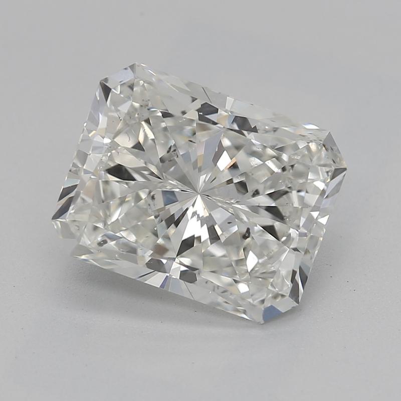 Behold a stunning diamond ring that epitomizes elegance and sophistication. At its heart lies a mesmerizing radiant diamond weighing 2.01 , masterfully graded H and SI2. This ring captures the light beautifully, creating a splendid dance of