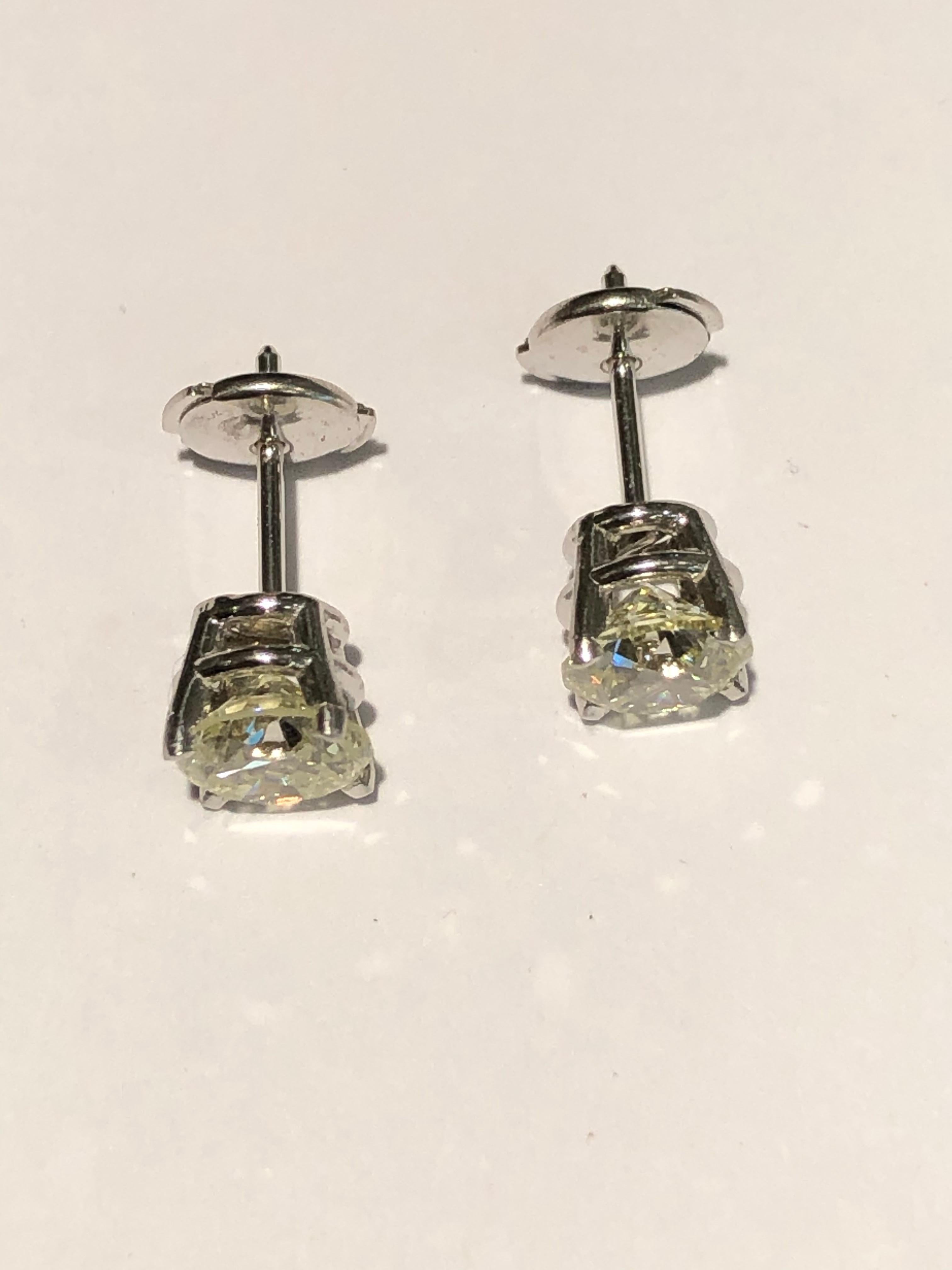 GIA 2.01 Carat Round Brilliant Cut Diamond Stud Earrings For Sale 5