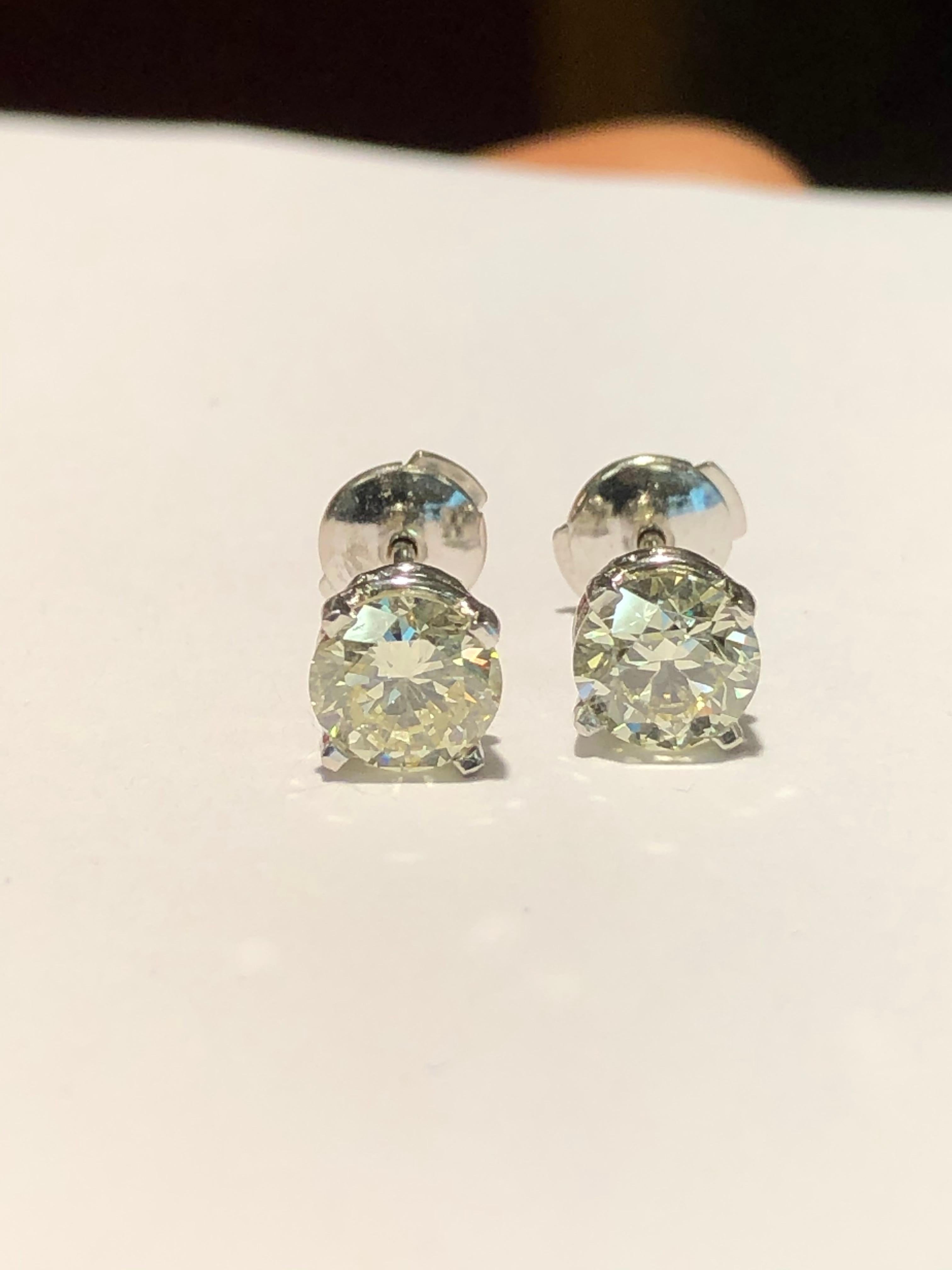 GIA 2.01 Carat Round Brilliant Cut Diamond Stud Earrings For Sale 4