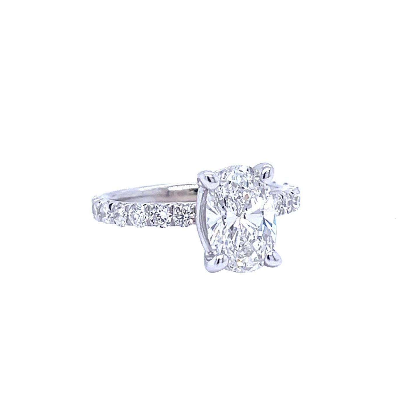 GIA 2.01 Natural Oval Cut Diamond Ring VVS2 With Pave Diamonds 18K White Gold In Excellent Condition For Sale In Aventura, FL