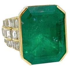 GIA 20.17 Carat Colombian Emerald
Diamond Ring 18k Yellow Gold GIA 20.17 Carat Colombian Emerald
Diamond Ring 18k Yellow Gold