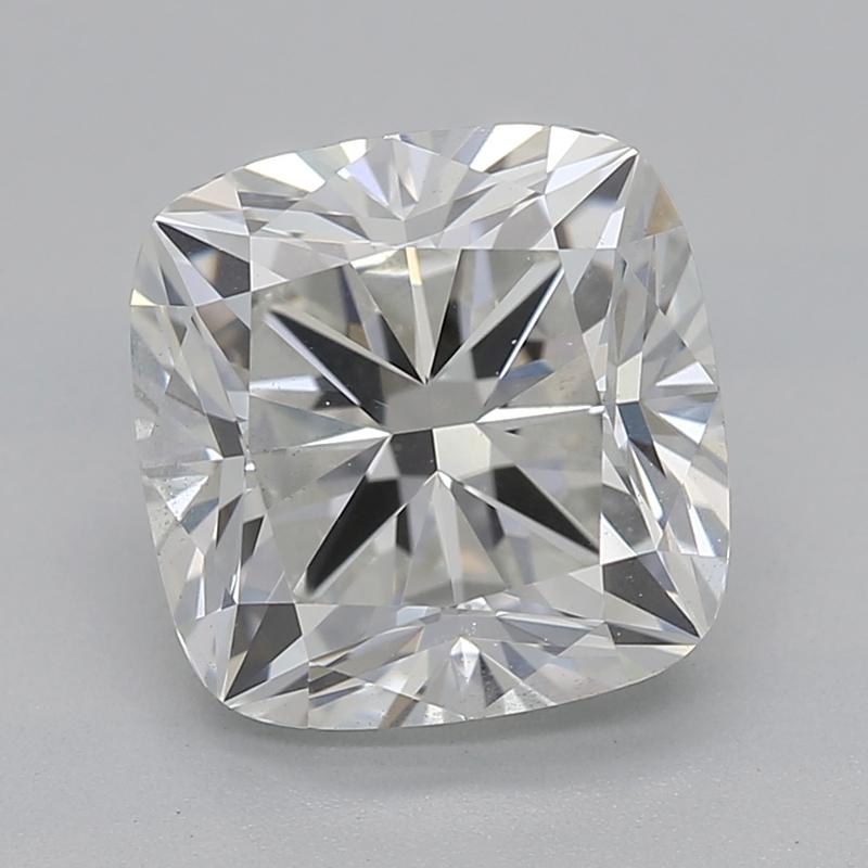 Handcrafted in New York, this stunning diamond ring features a captivating, GIA-certified center stone of cushion diamonds weighing 2.01 and graded I and SI1. The brilliance and fire of the center stone are beautifully complemented by a row of