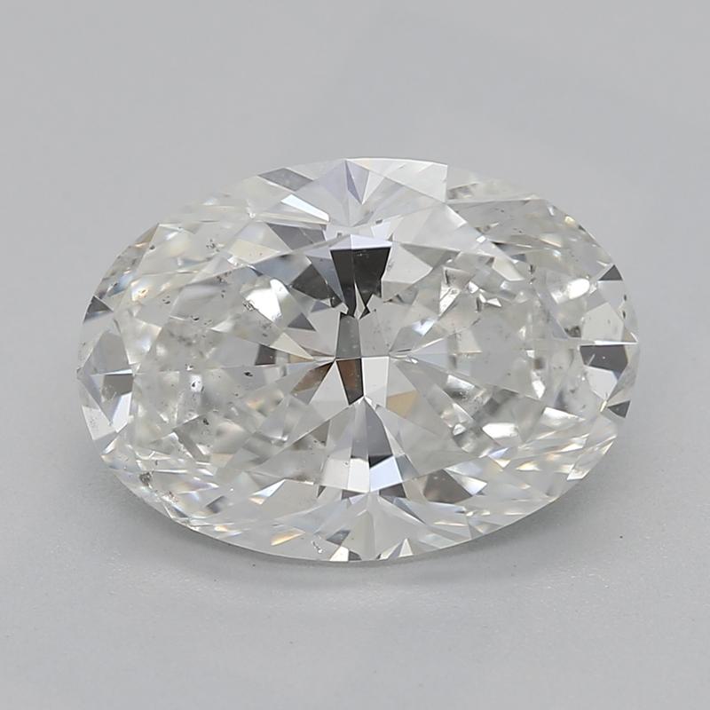 Dieser exquisite, in New York handgefertigte Diamantring besticht durch sein Design, das die Brillanz der Diamanten in ein bezauberndes Blumenmotiv verwandelt. Sein Herzstück ist ein prächtiger ovaler Diamant mit einem beeindruckenden Gewicht von