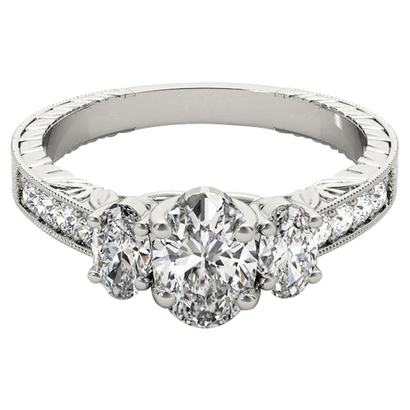 GIA 2,01ct ovale a tre pietre inciso su canale  Anello con diamante