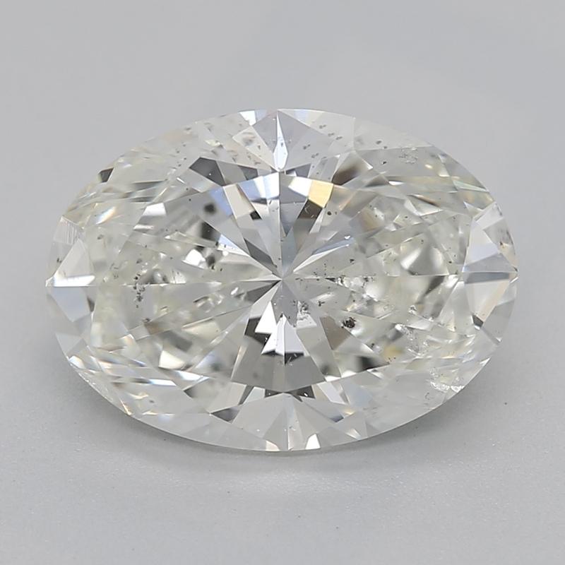 A remarkable oval diamond ring that fuses vintage glamour with modern artistry. Central to this exquisite piece is a stunning 2.01 diamond, radiating brilliance under any light, with its refined I and impressive SI2. The vivid sparkle of the center