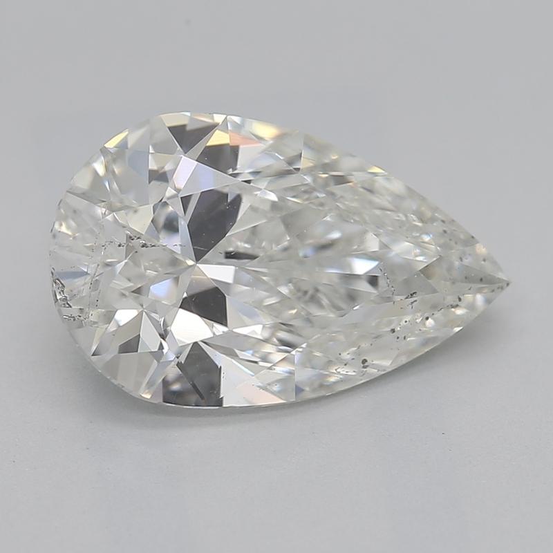 Elegantly crafted, this remarkable diamond ring features a stunning center stone of pear 2.01 , showcasing exquisite J and SI2. The solitaire is beautifully secured in a classic prong setting, emphasizing its brilliance and sophistication.