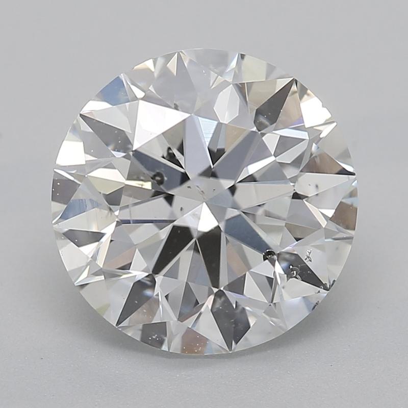 Un magnifico anello di diamanti con una splendida pietra centrale rotonda, del peso di ben 2,01 e con un'impeccabile E e SI2. Questo squisito pezzo è sapientemente realizzato in oro bianco, per offrire una luce calda e radiosa che esalta la
