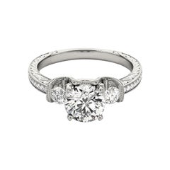 GIA 2.01ct Tondo a tre pietre inciso su canale  Anello con diamante