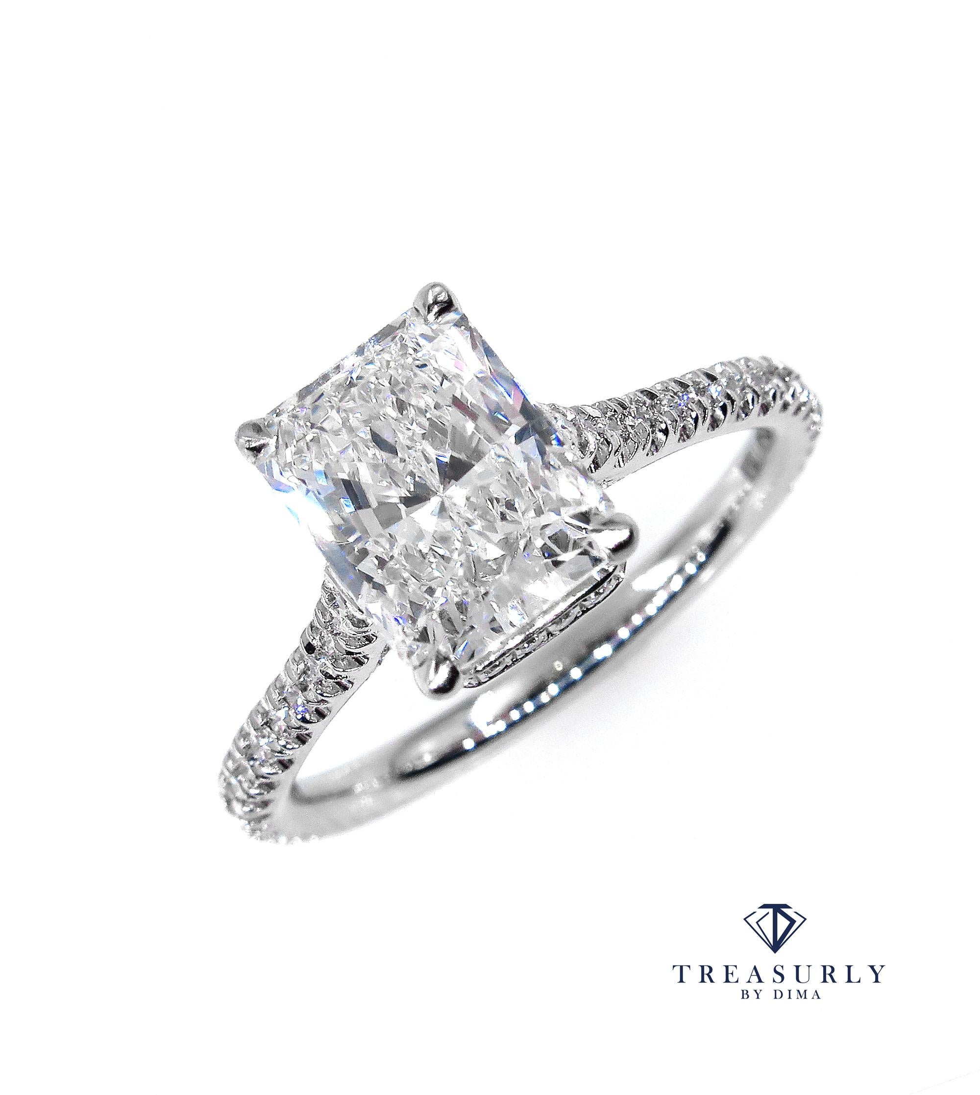 This ring is just breathtaking and SUPER Fine and truly show stopper, 2.01ct in total!
A Beautiful and Elegant Solitaire Elongated Radiant Cut Diamond Ring with 1.71ct GIA CERTIFIED I Color VS1 Clarity (Near-colorless, eye clear), 100% NATURAL. The