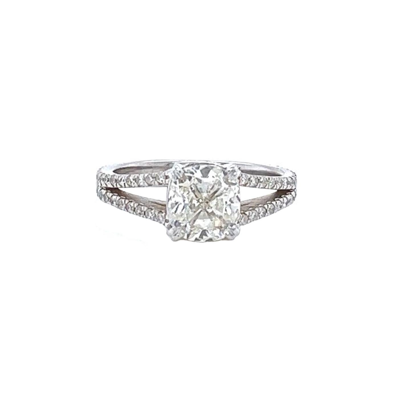 Beautiful Diamond Ring with GIA certification. The ring features a 2.02-carat Cushion cut eye clean natural Diamond of J color and Si1 clarity and it is surrounded by smaller pave diamonds, Ring is crafted in 14 Karat White Gold with dimensions of