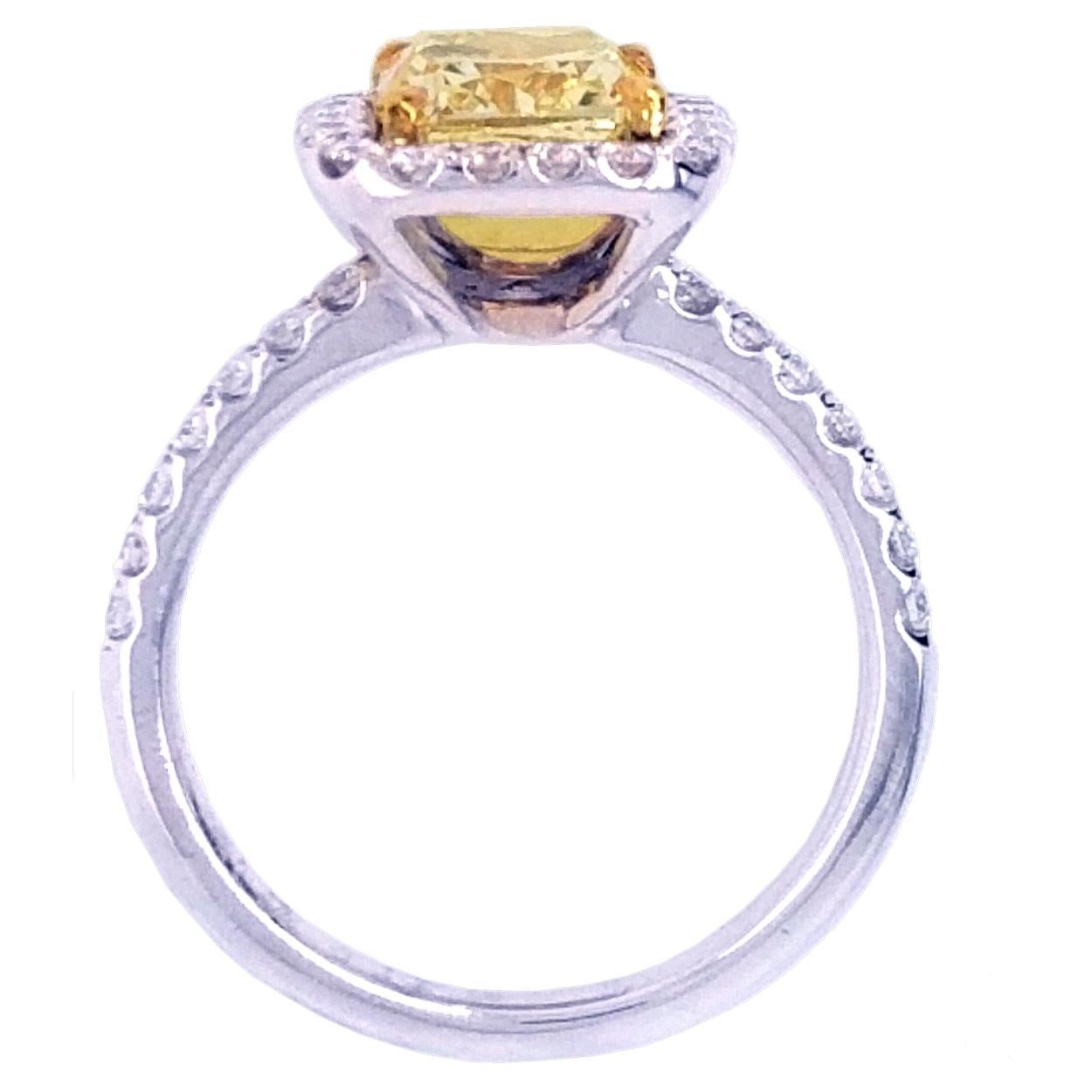 Contemporary GIA 2.02 Ct Yellow Cushion Diamond Pave Set 18K Engagement Ring with Halo For Sale